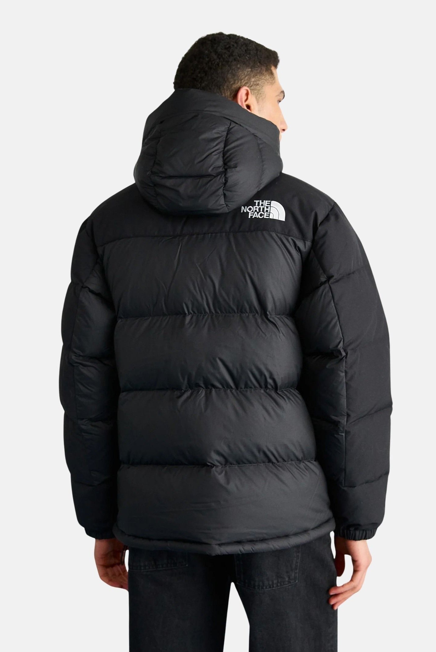 THE NORTH FACE Piumino Himalayan nero da uomo con logo laterale NF0A4QYXGOF1 . THE NORTH FACE
