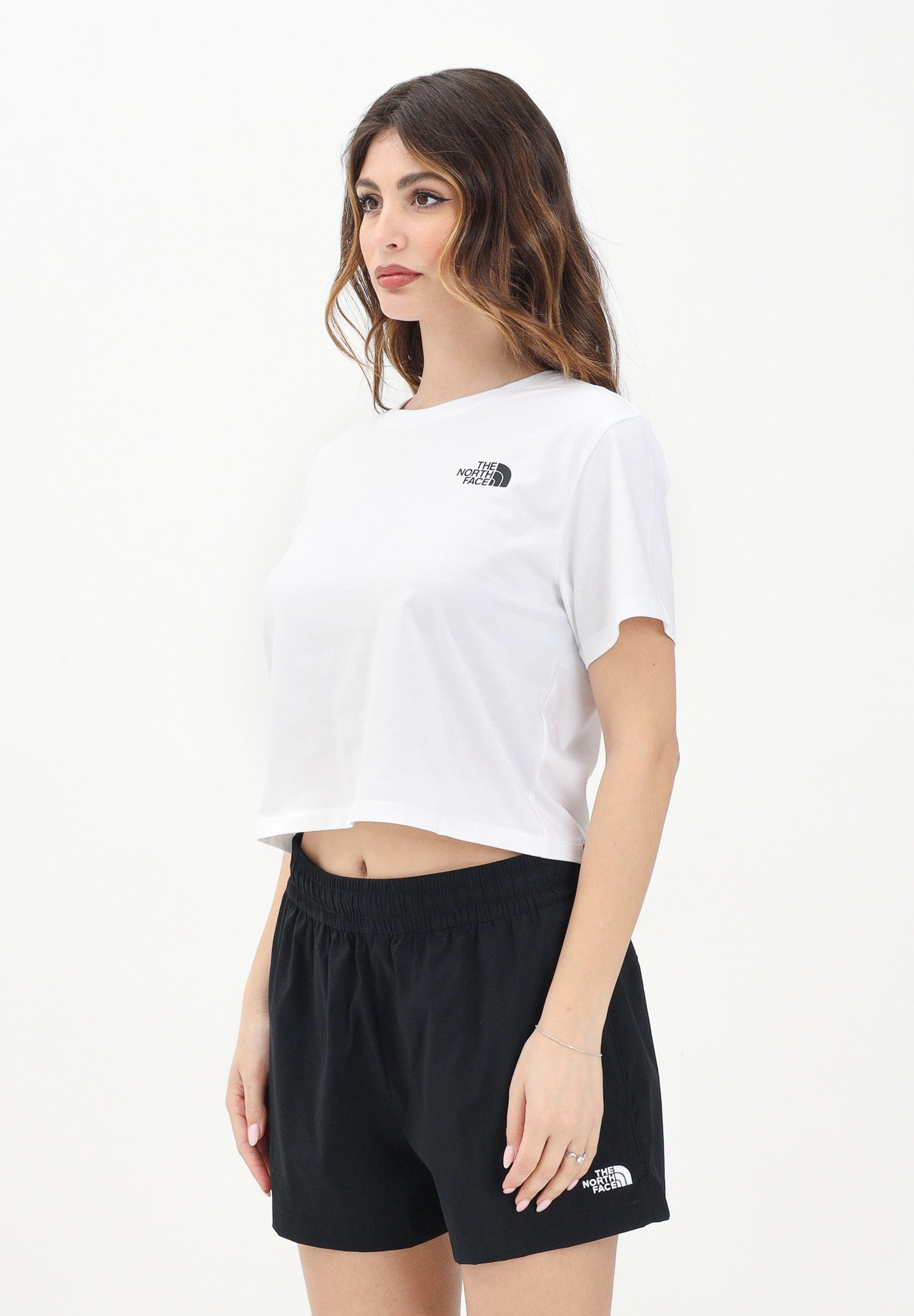 THE NORTH FACE T-shirt a manica corta Cropped bianca da donna con logo NF0A87U4FN41 . THE NORTH FACE