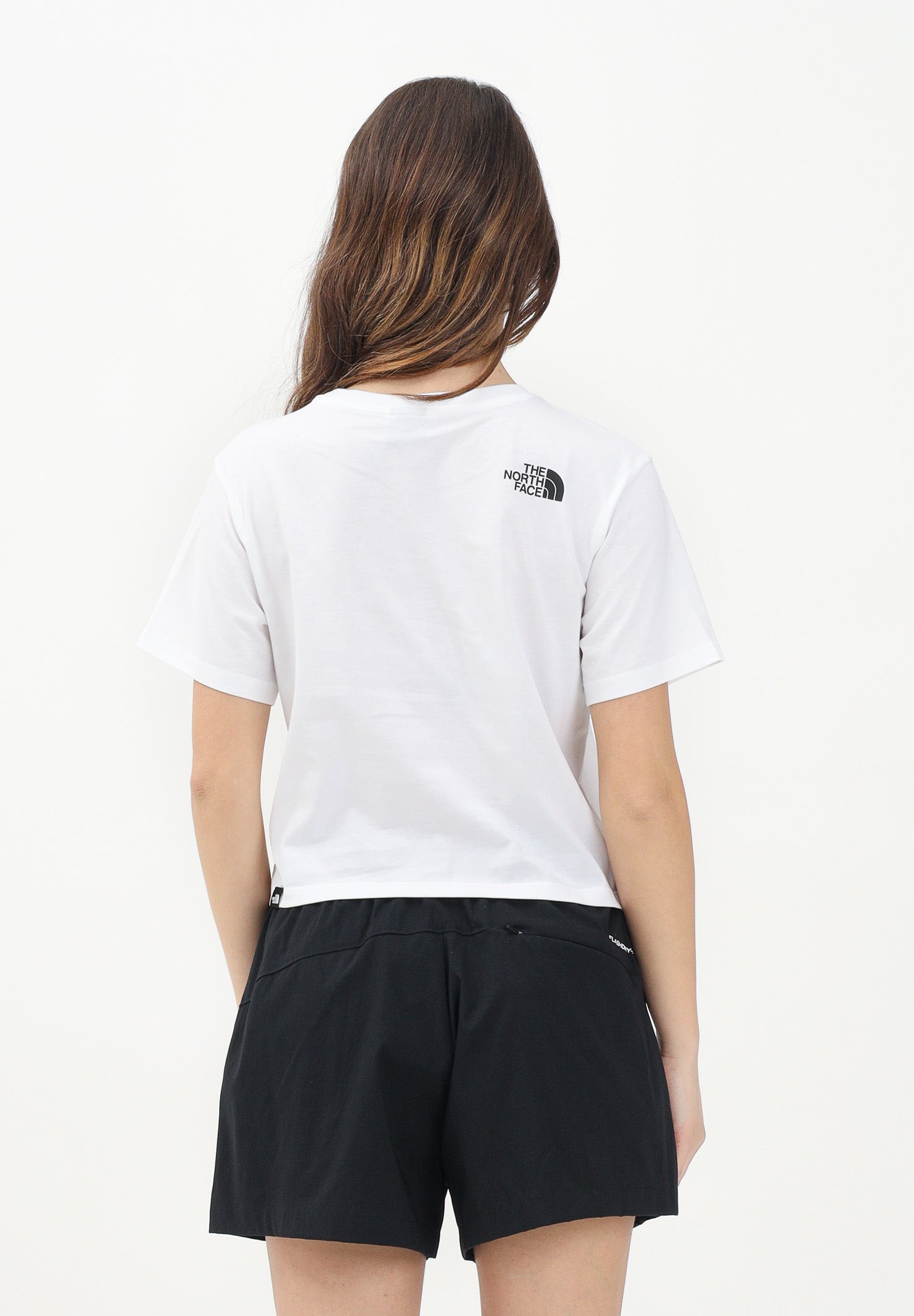 THE NORTH FACE T-shirt a manica corta Cropped bianca da donna con logo NF0A87U4FN41 . THE NORTH FACE