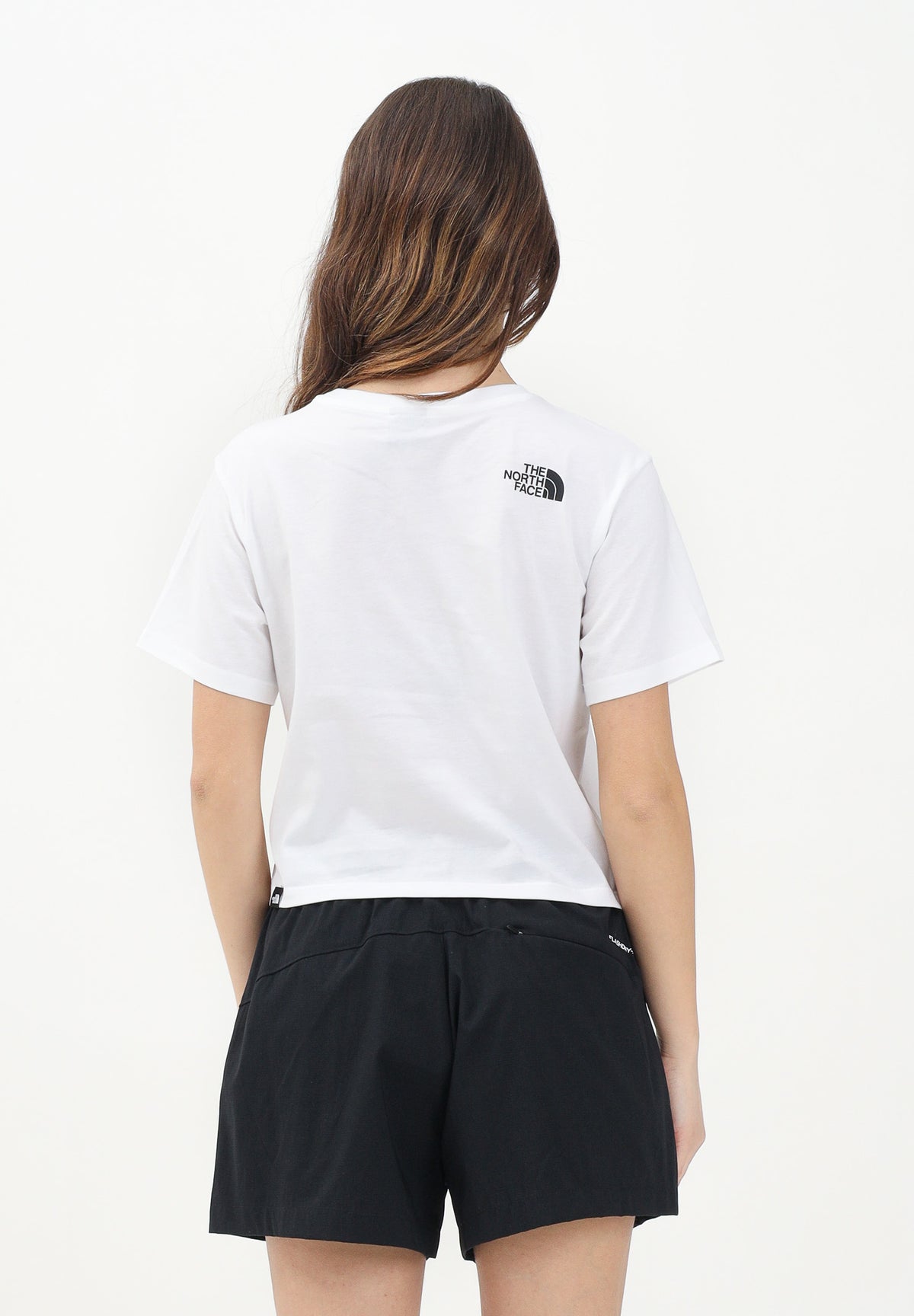THE NORTH FACE T-shirt a manica corta Cropped bianca da donna con logo NF0A87U4FN41 . THE NORTH FACE