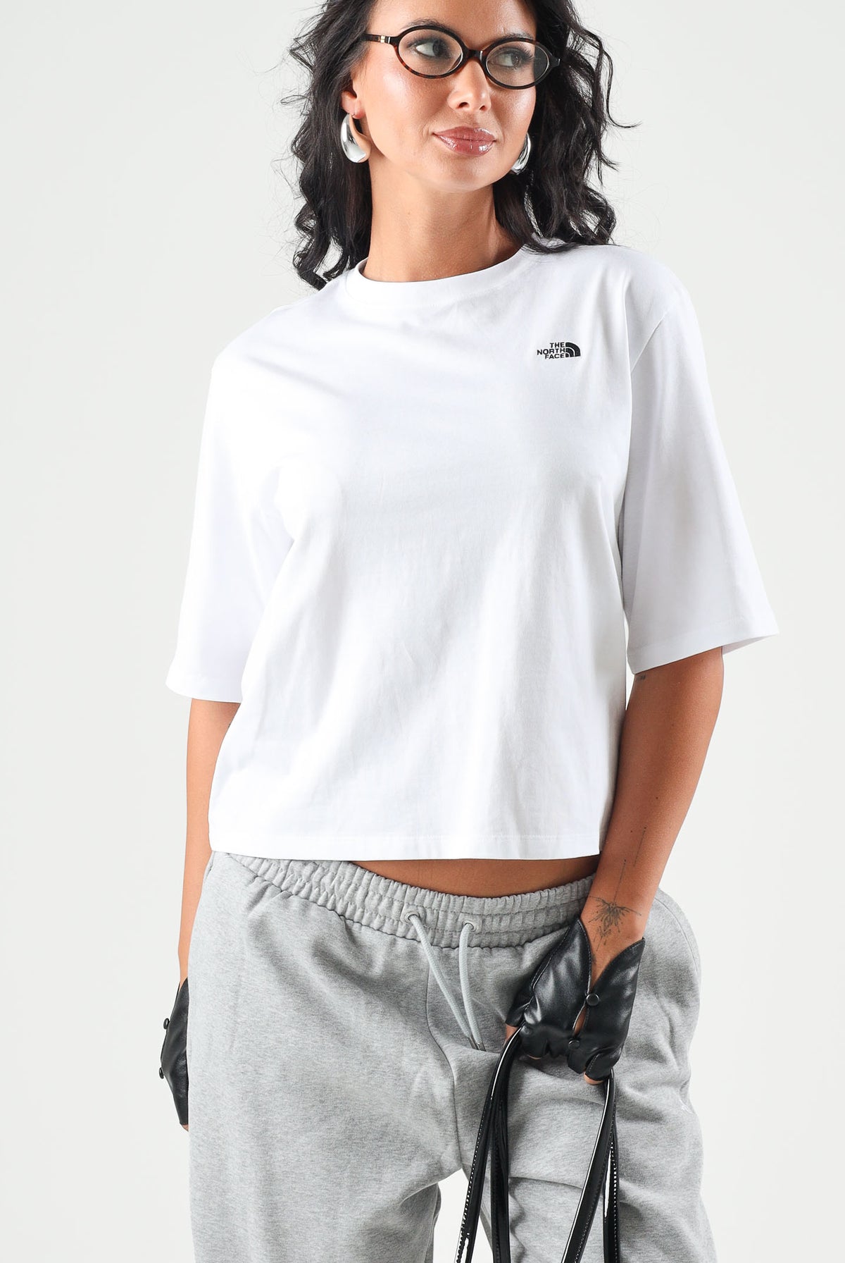 THE NORTH FACE T-shirt manica corta SIMPLE DOME bianca da donna con piccolo logo stampato sul petto. NF0A8H71FN41 . THE NORTH FACE