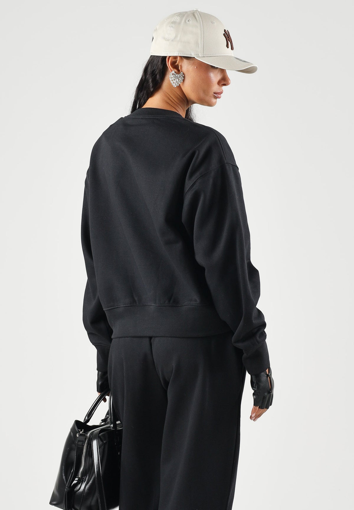 THE NORTH FACE Felpa girocollo SIMPLE DOME CREW nera da donna con logo minimal sul petto. NF0A8HBYJK31 . THE NORTH FACE