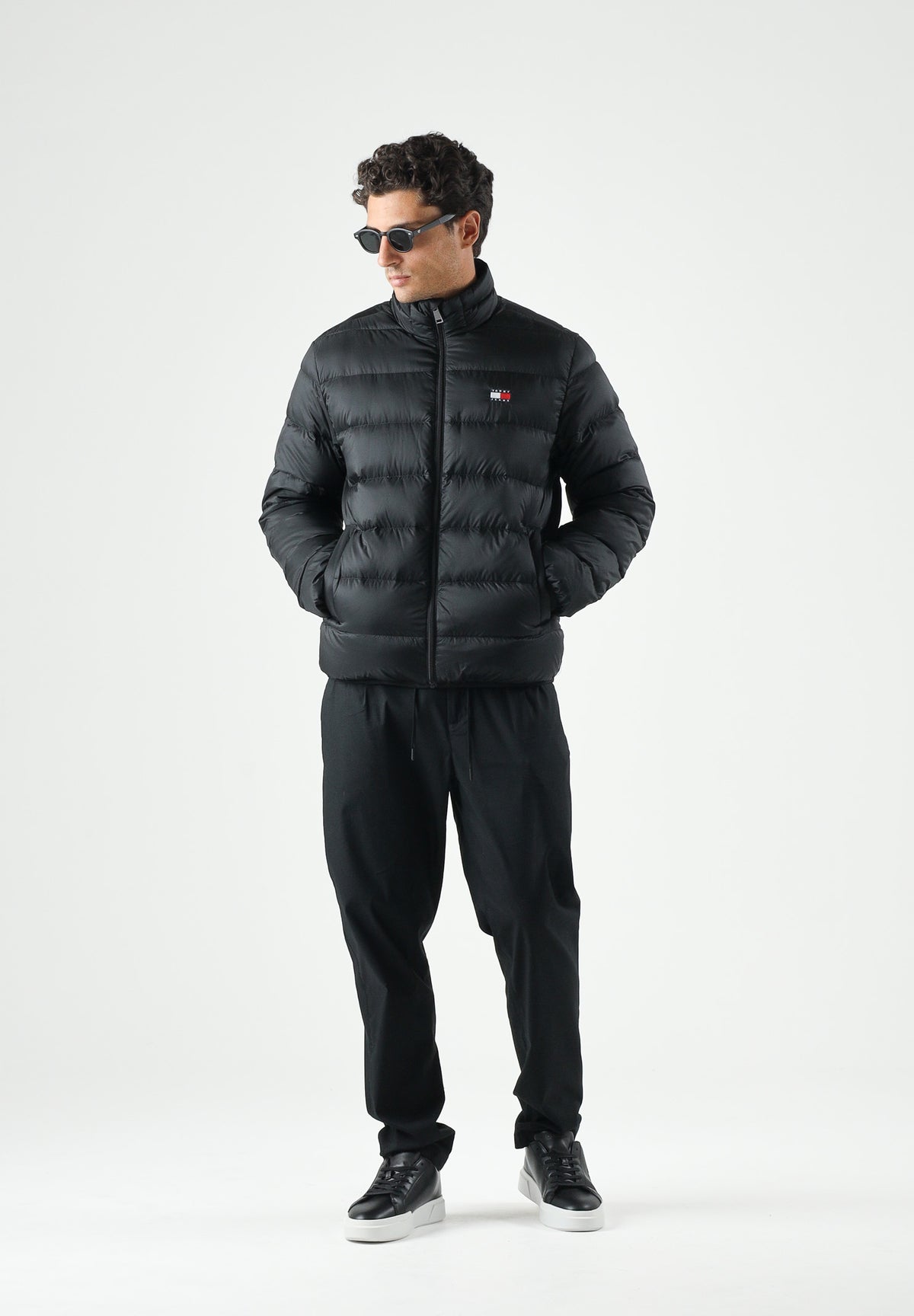 TOMMY JEANS Giubbotto Piumino relaxed fit leggero ripiegabile in ripstop black nero, da uomo DM0DM23231 BDS TOMMY JEANS