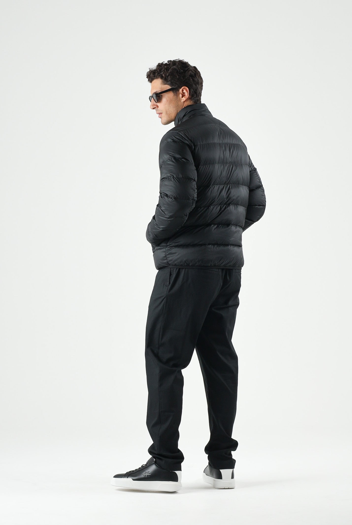 TOMMY JEANS Giubbotto Piumino relaxed fit leggero ripiegabile in ripstop black nero, da uomo DM0DM23231 BDS TOMMY JEANS