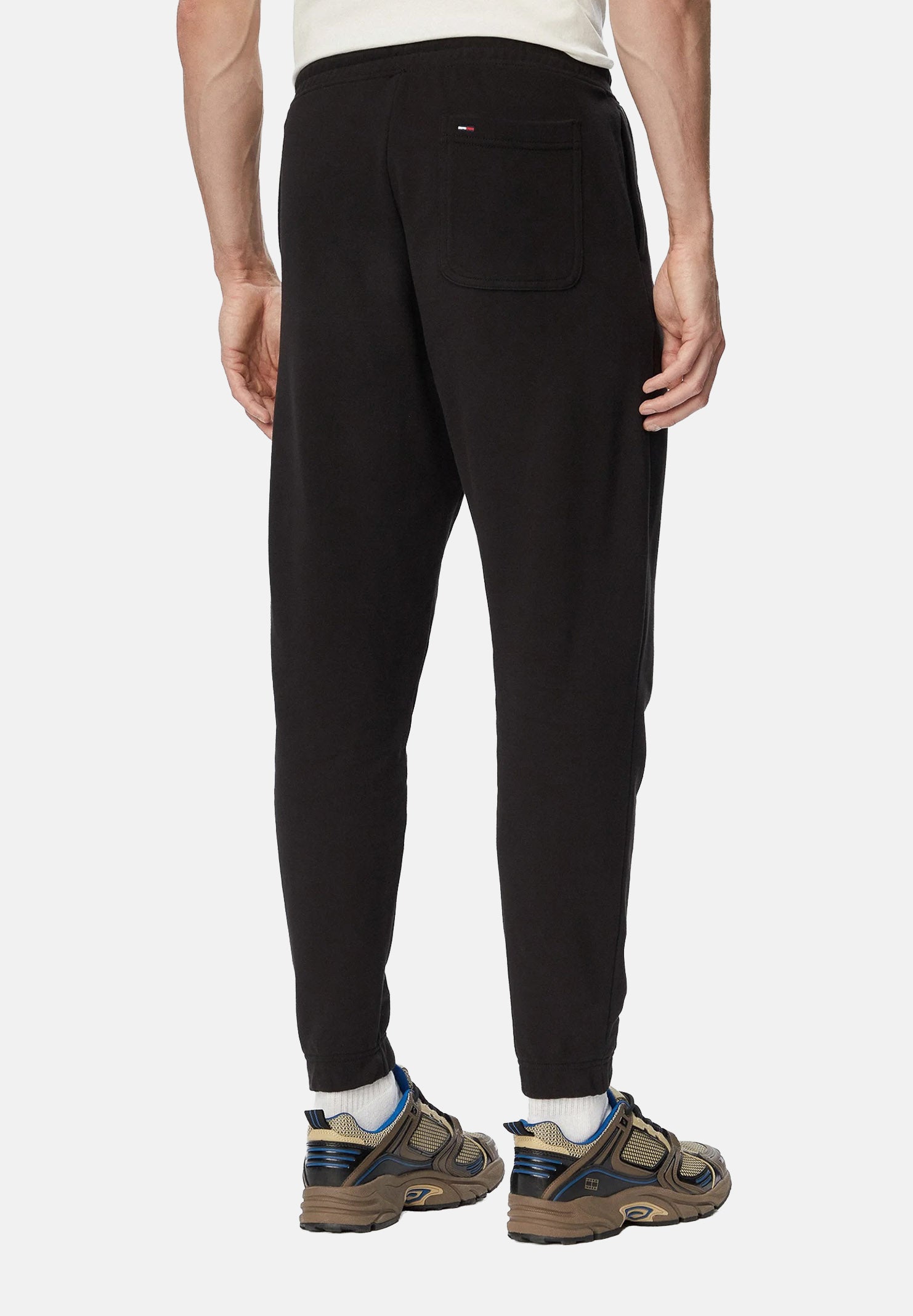 TOMMY JEANS Pantaloni da tuta TJM REGULAR nero da uomo con logo firma a contrasto.<BR/> DM0DM23903 BDS TOMMY JEANS