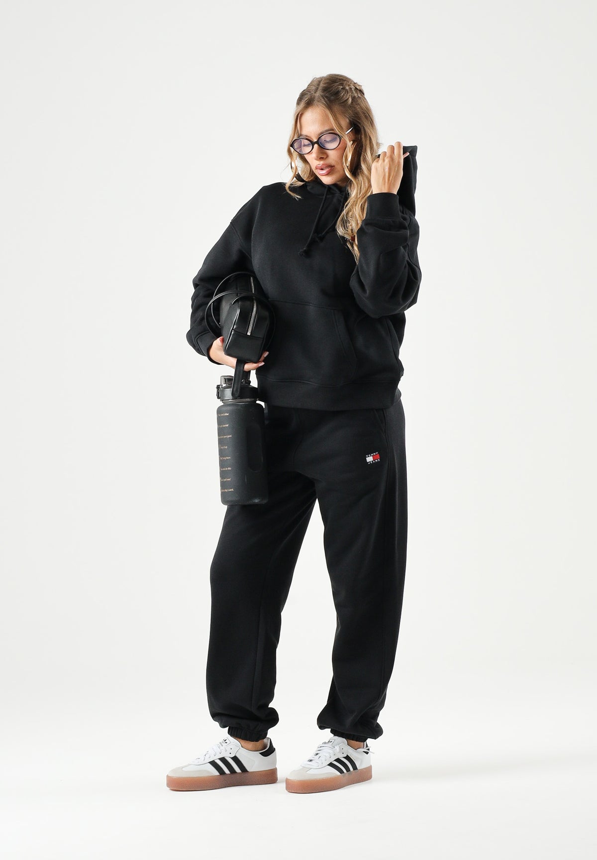 TOMMY JEANS Pantaloni jogger neri da donna con mini logo laterale<BR/> DW0DW22780 BDS TOMMY JEANS