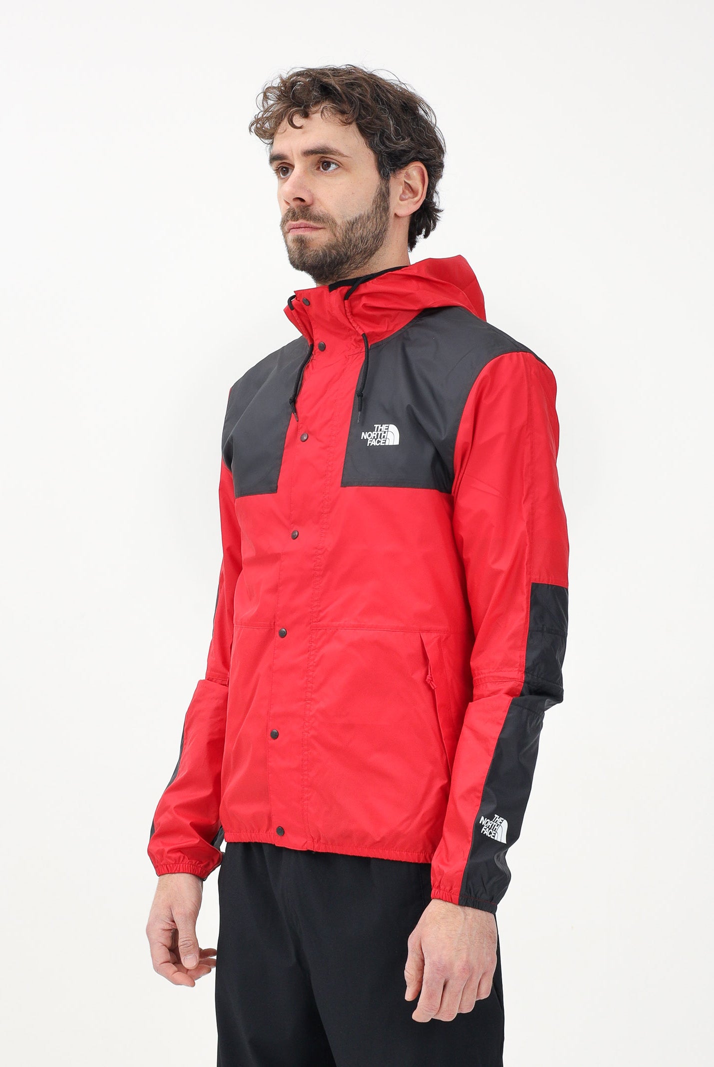 THE NORTH FACE Giacca a vento Seasonal Mountain rossa e nera da uomo NF0A5IG354A1 . THE NORTH FACE