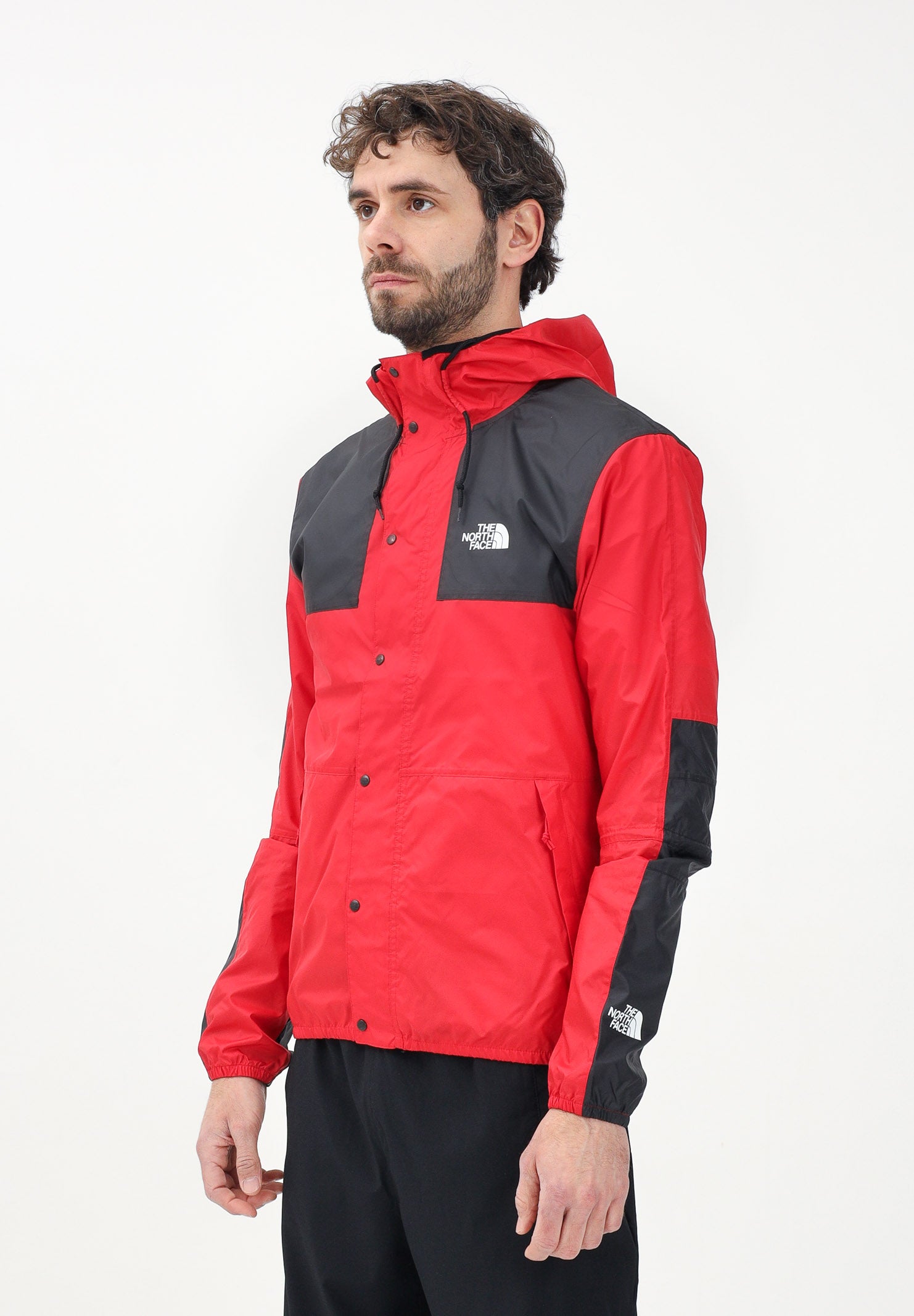 THE NORTH FACE Giacca a vento Seasonal Mountain rossa e nera da uomo NF0A5IG354A1 . THE NORTH FACE