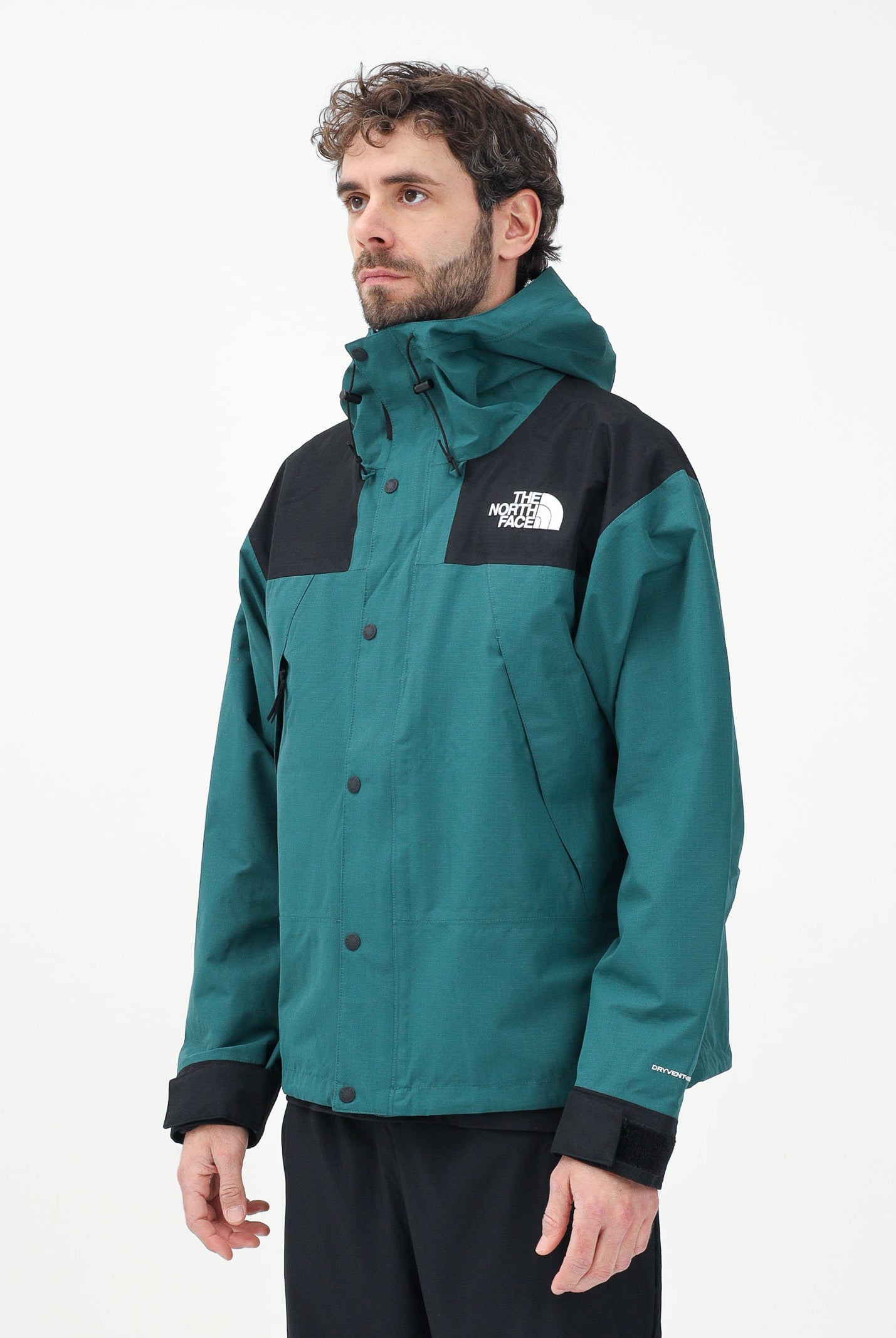 THE NORTH FACE Giacca a vento Mountain Mono verde da uomo NF0A88XF5861 . THE NORTH FACE