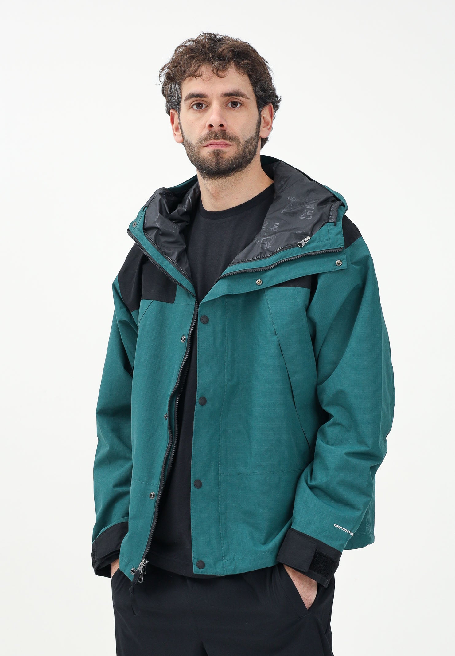THE NORTH FACE Giacca a vento Mountain Mono verde da uomo NF0A88XF5861 . THE NORTH FACE