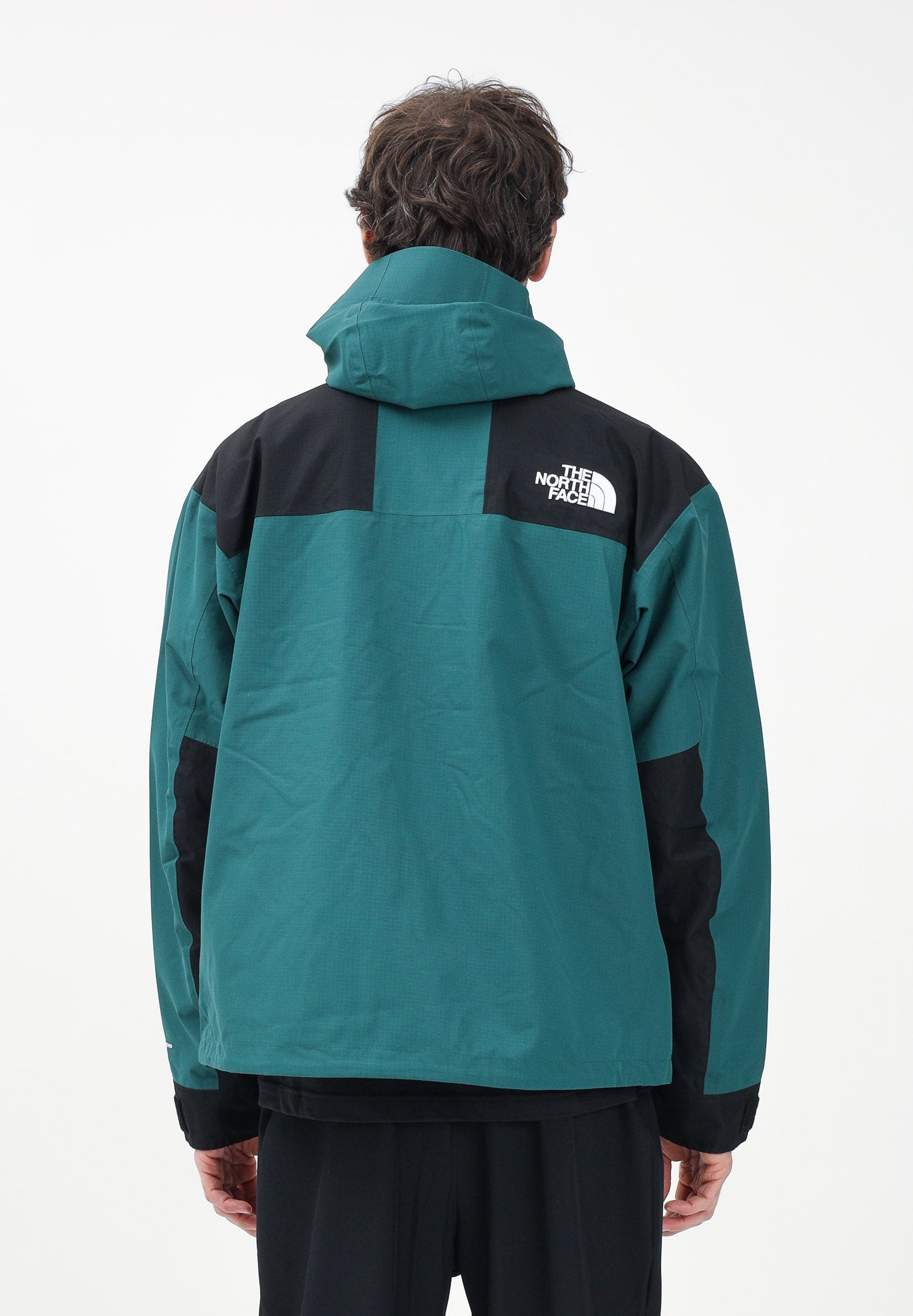 THE NORTH FACE Giacca a vento Mountain Mono verde da uomo NF0A88XF5861 . THE NORTH FACE