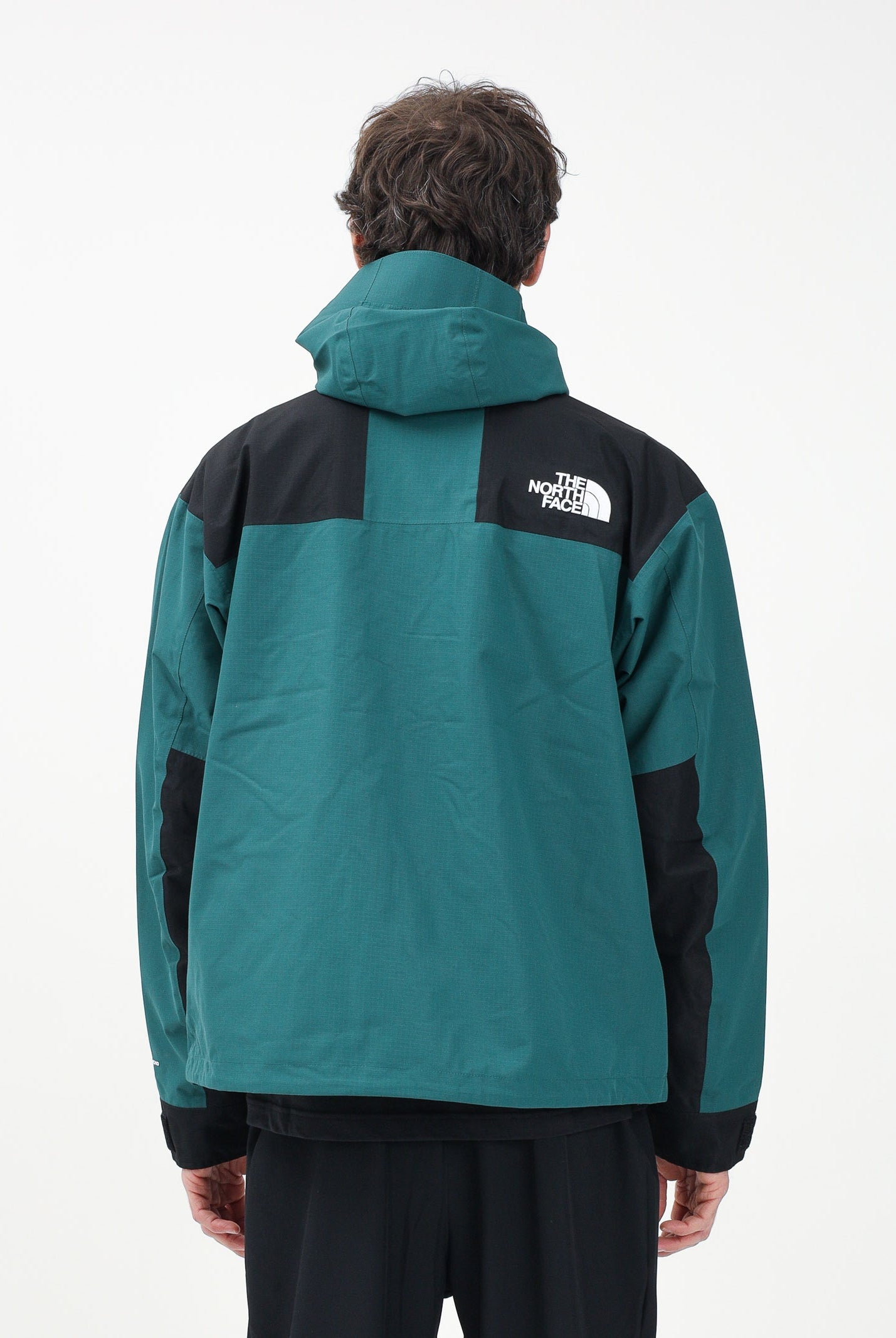 THE NORTH FACE Giacca a vento Mountain Mono verde da uomo NF0A88XF5861 . THE NORTH FACE