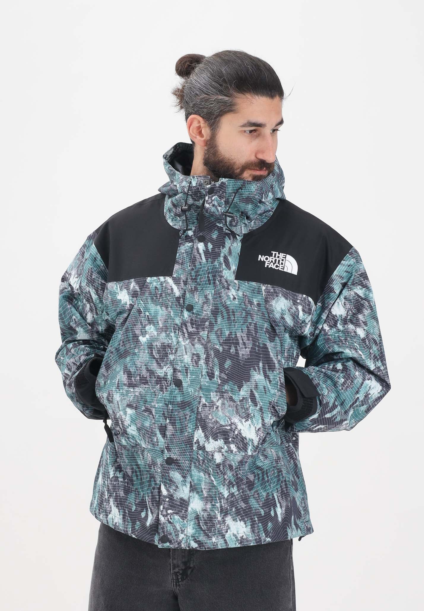 THE NORTH FACE Giacca a vento DryVent™ Mono Mountain da uomo con fantasia verde e nera NF0A88XF87A1 . THE NORTH FACE