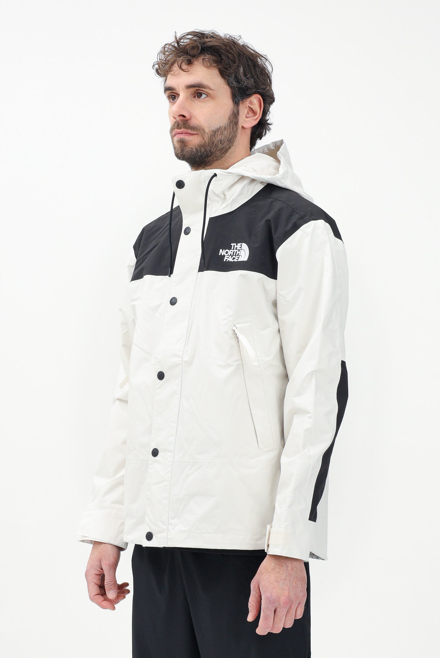 THE NORTH FACE Giacca a vento Reign On bianca e nera da uomo NF0A8B5GROU1 . THE NORTH FACE
