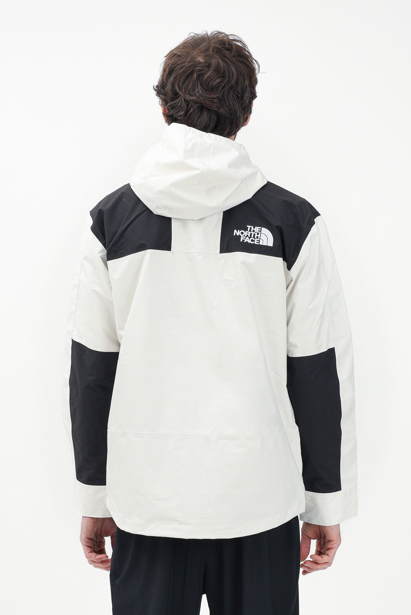 THE NORTH FACE Giacca a vento Reign On bianca e nera da uomo NF0A8B5GROU1 . THE NORTH FACE