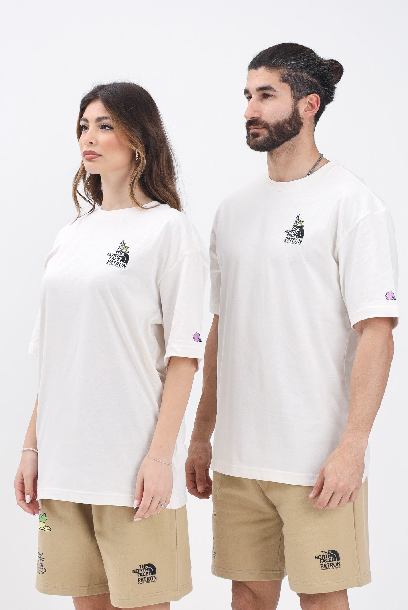 THE NORTH FACE T-shirt a manica corta Clean Trails Oversized panna per uomo e donna NF0A8C2TQLI1 . THE NORTH FACE