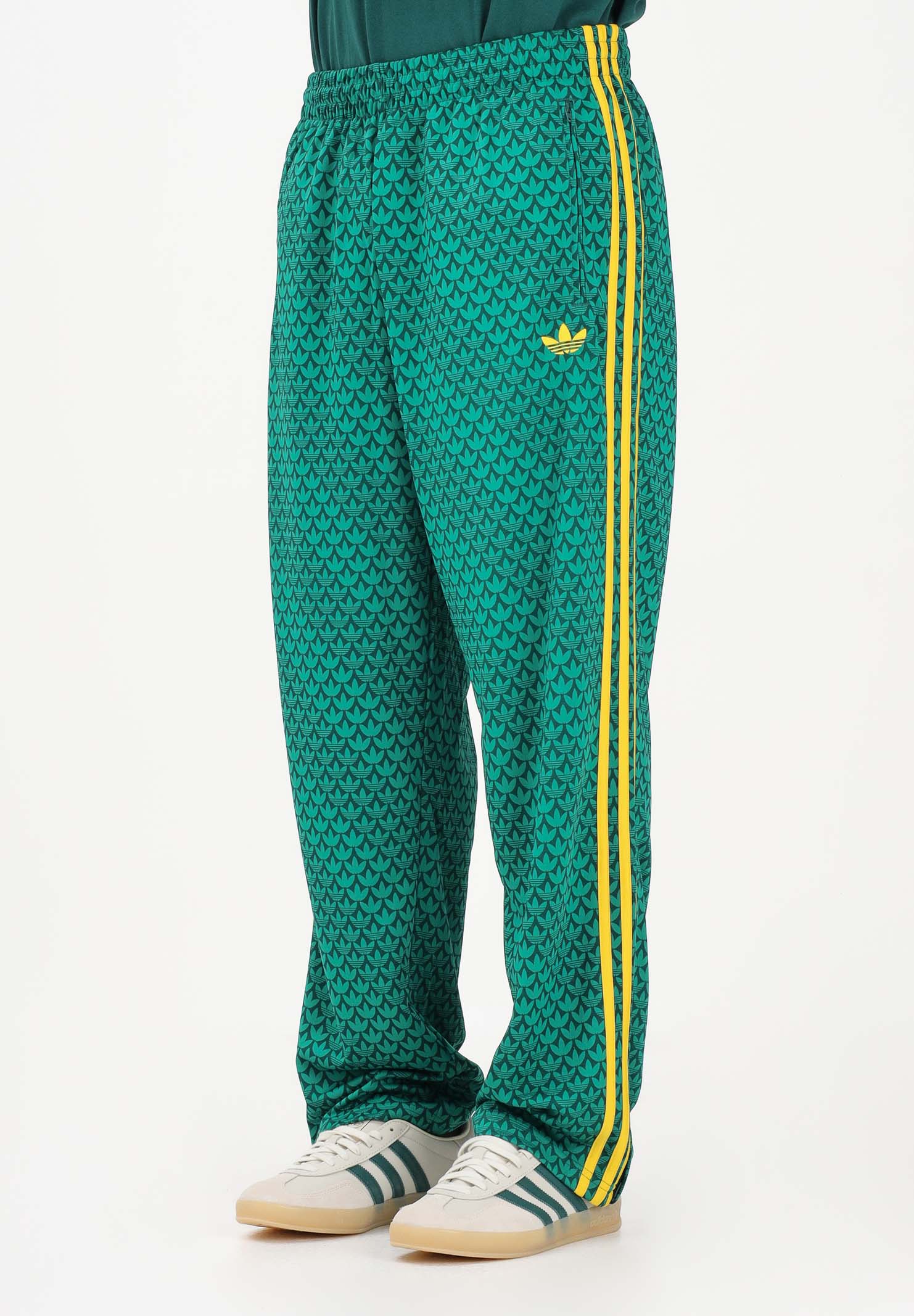 ADIDAS ORIGINALS Pantalone sportivo FIREBIRD LOOSE MONOGRAM verde e giallo da uomo KD0396 . ADIDAS ORIGINALS