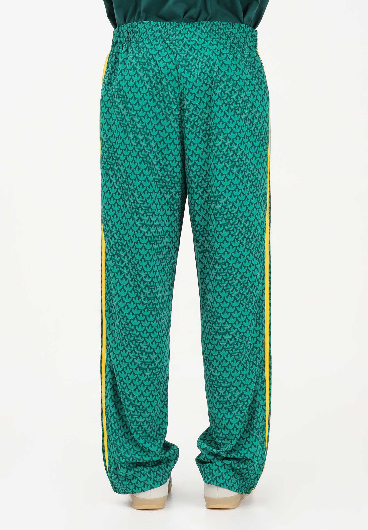 ADIDAS ORIGINALS Pantalone sportivo FIREBIRD LOOSE MONOGRAM verde e giallo da uomo KD0396 . ADIDAS ORIGINALS