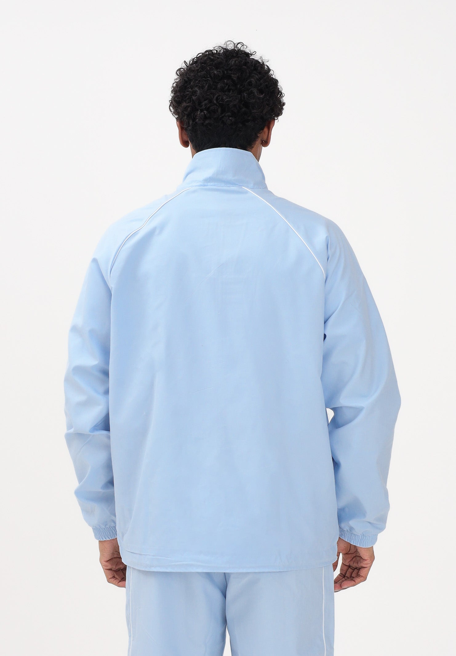 ADIDAS ORIGINALS Giacca a vento CHEST STRIPES celeste da uomo KE2164 . ADIDAS ORIGINALS