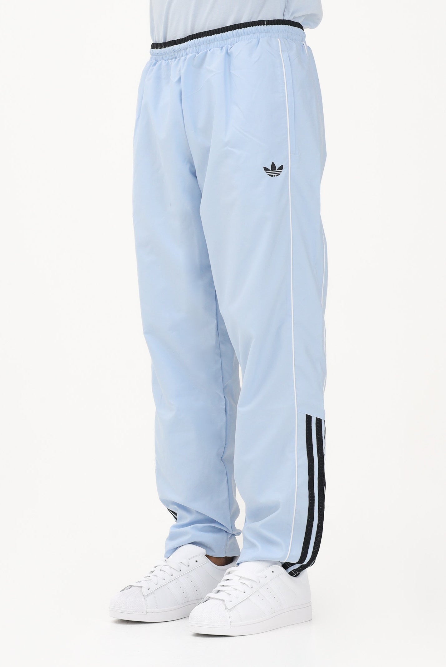 ADIDAS ORIGINALS Pantalone sportivo HALF STRIPES celeste da uomo KE2165 . ADIDAS ORIGINALS