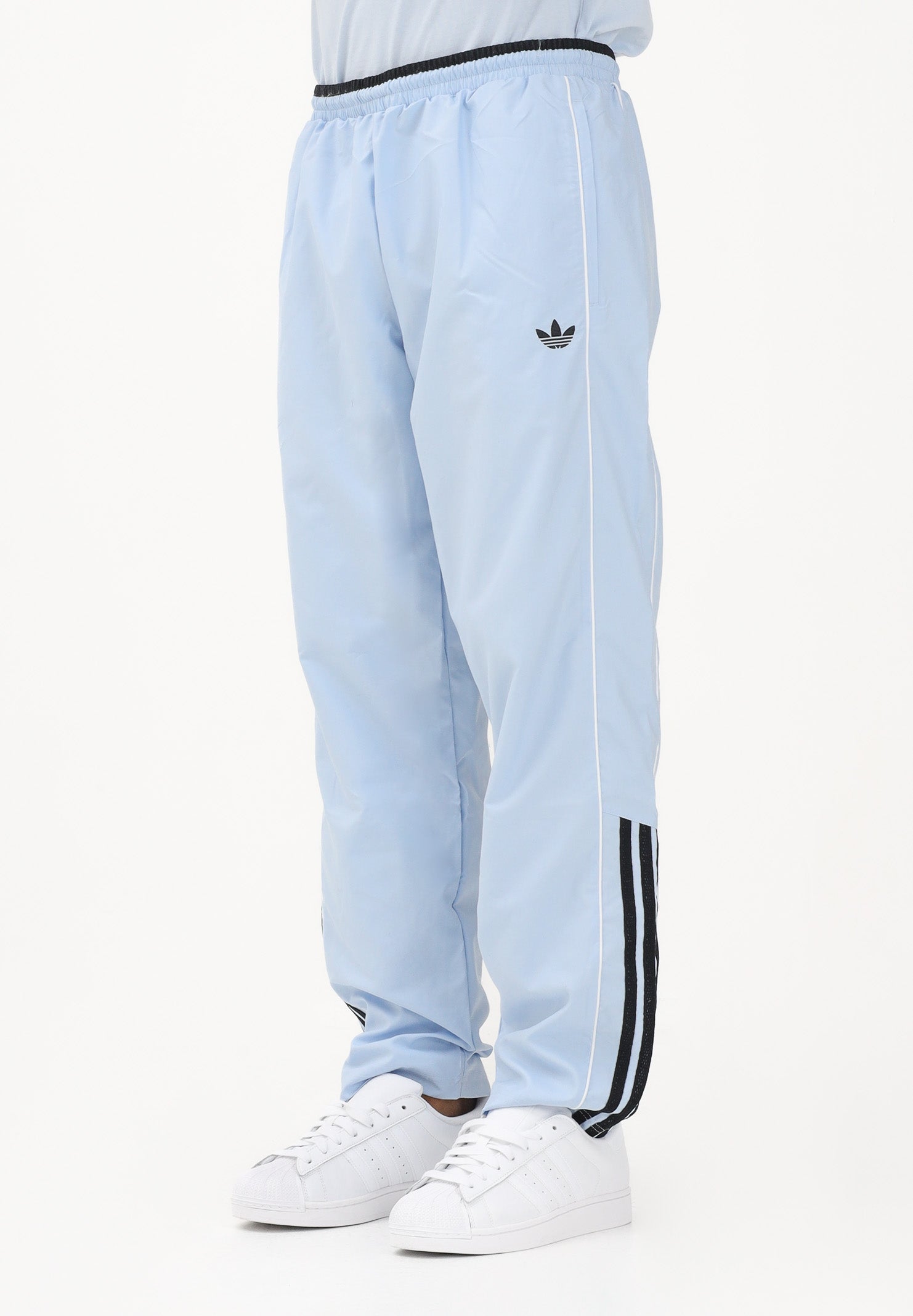 ADIDAS ORIGINALS Pantalone sportivo HALF STRIPES celeste da uomo KE2165 . ADIDAS ORIGINALS