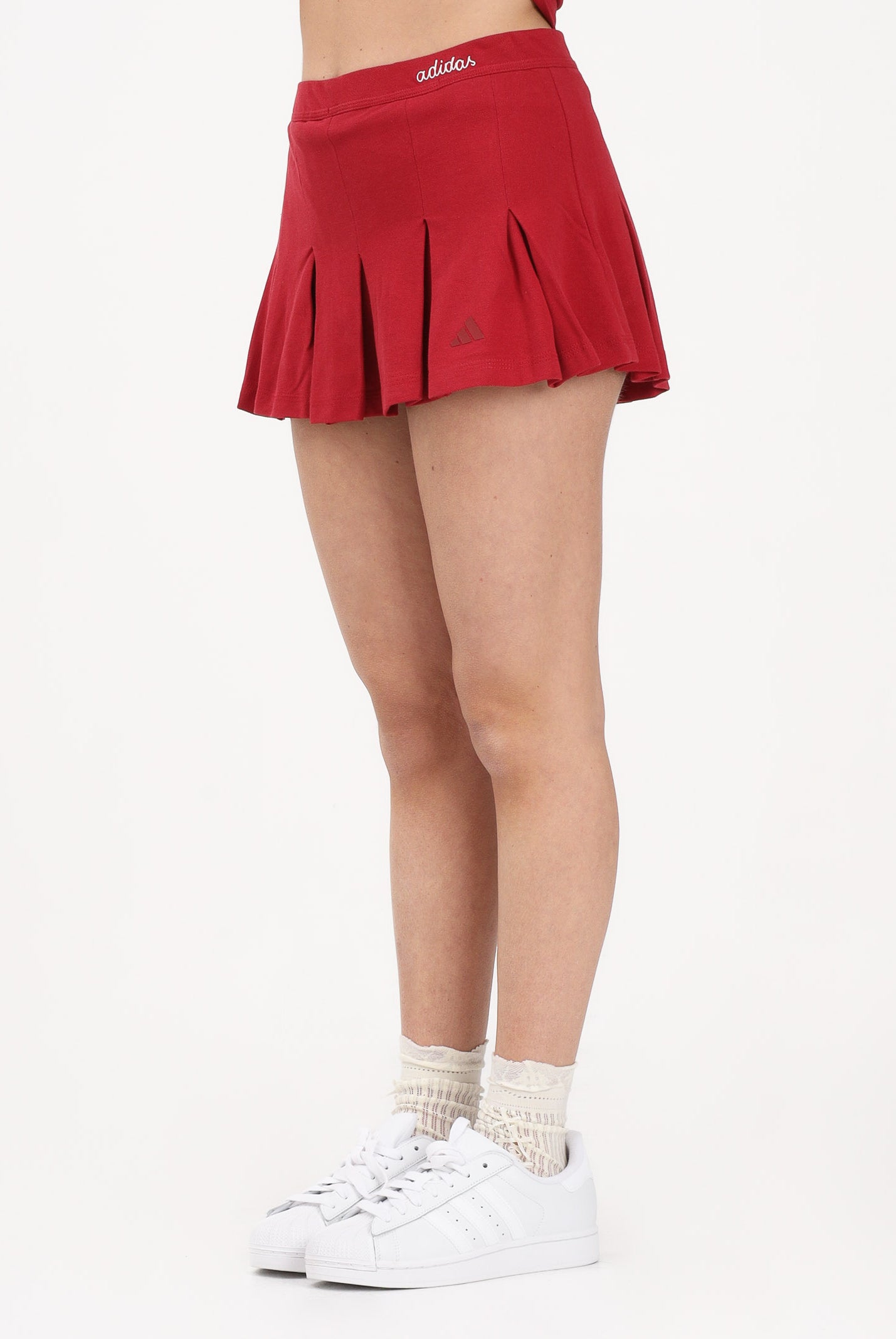 ADIDAS PERFORMANCE Gonna Seasonal Essentials Colorpop rossa da donna con leggings interni<BR/> KD3372 . ADIDAS PERFORMANCE