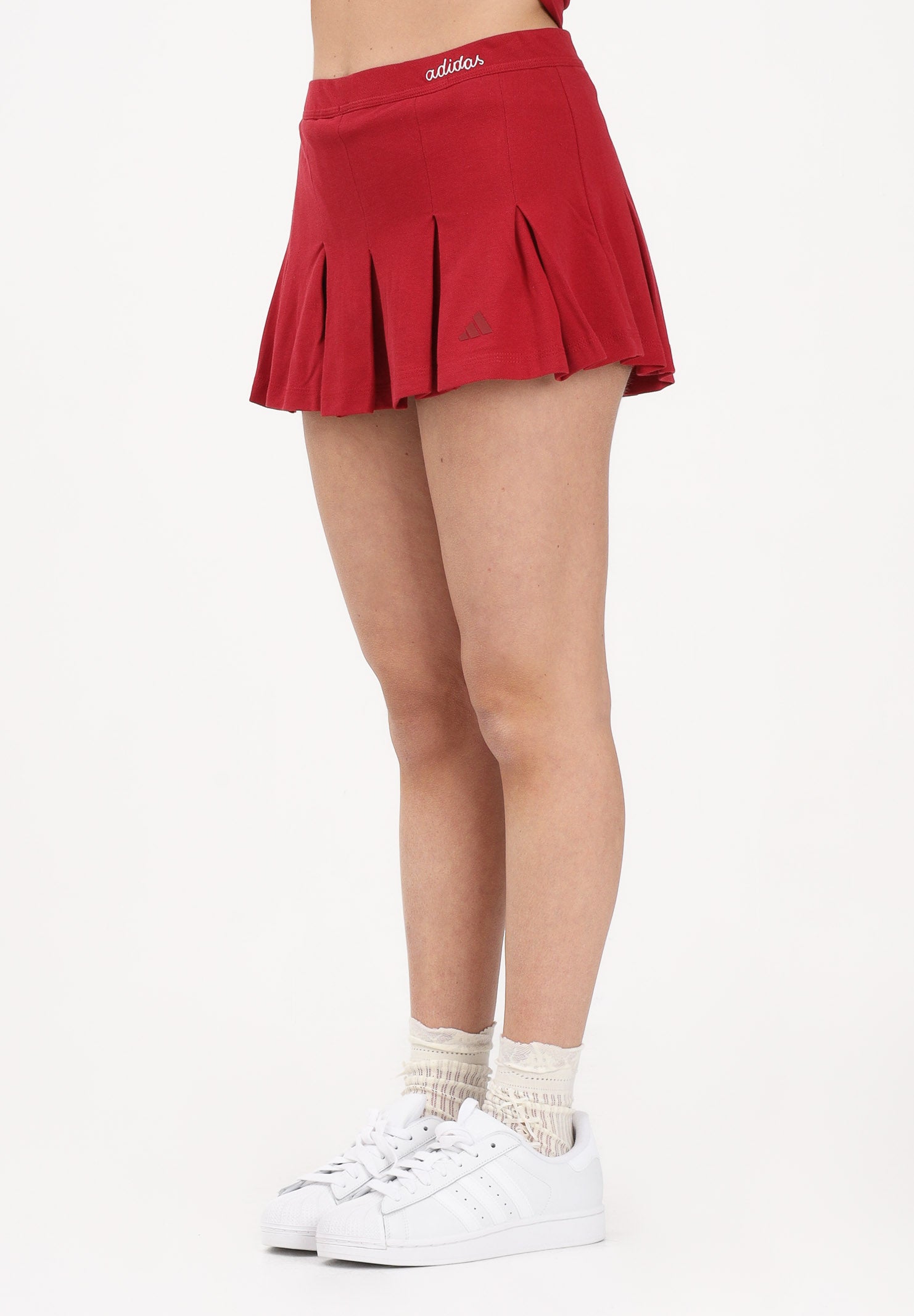 ADIDAS PERFORMANCE Gonna Seasonal Essentials Colorpop rossa da donna con leggings interni<BR/> KD3372 . ADIDAS PERFORMANCE