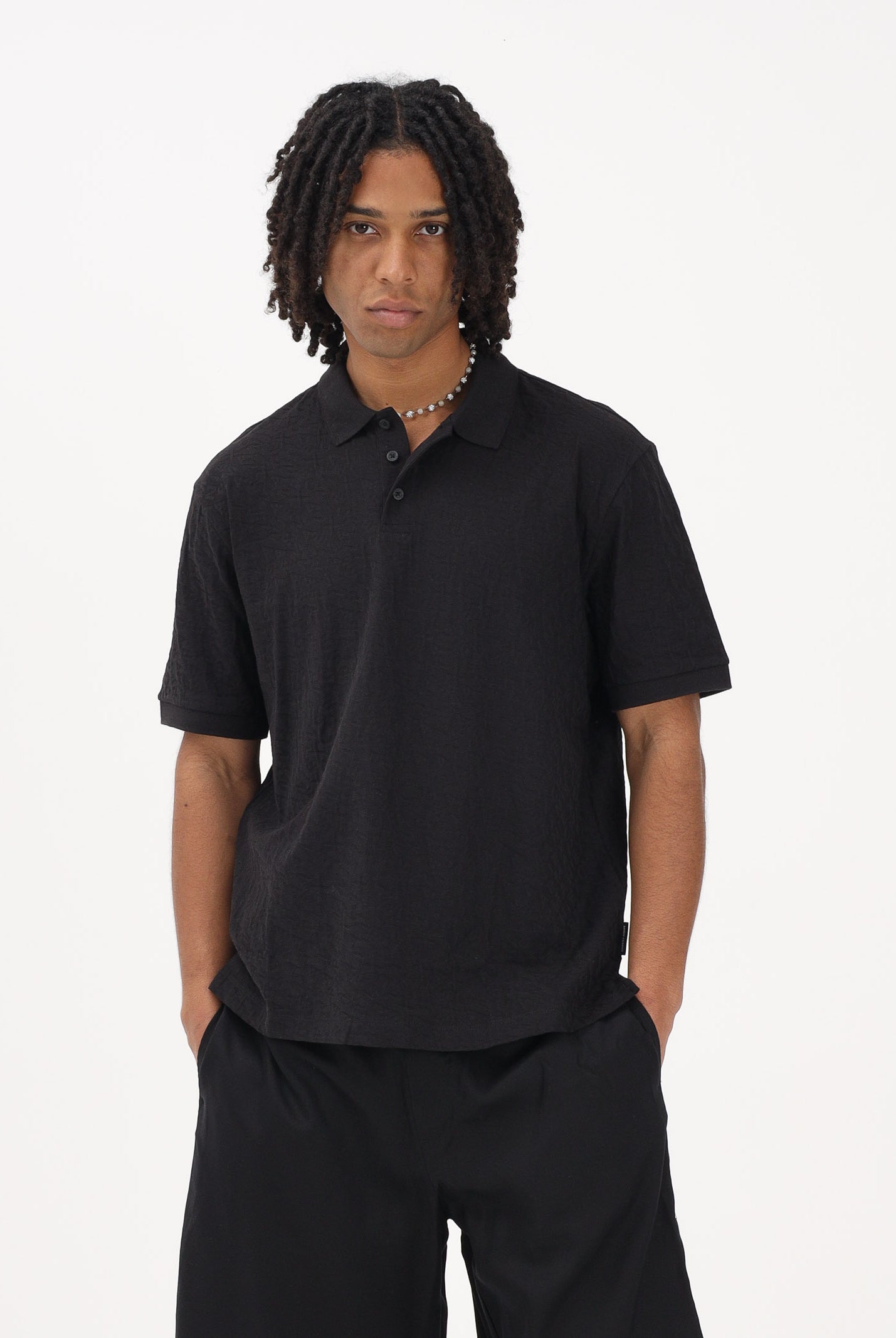 ARMANI EXCHANGE Polo a manica corta nera da uomo con logo all-over XM002346AF10337 UC001 ARMANI EXCHANGE