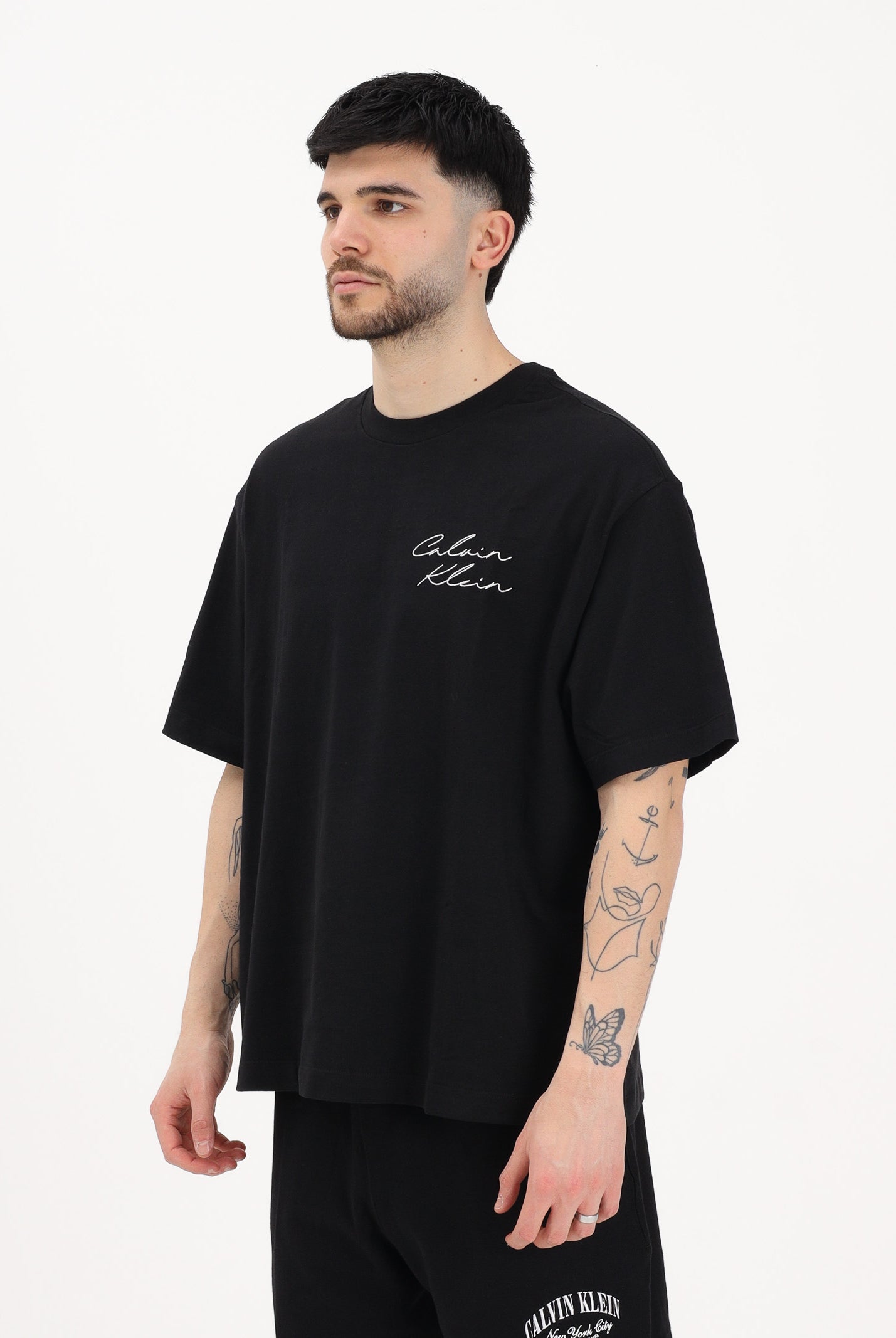 CALVIN KLEIN JEANS T-shirt a manica corta nera da uomo con logo frontale e stampa sul retro LV04RE828G UB1 CALVIN KLEIN JEANS