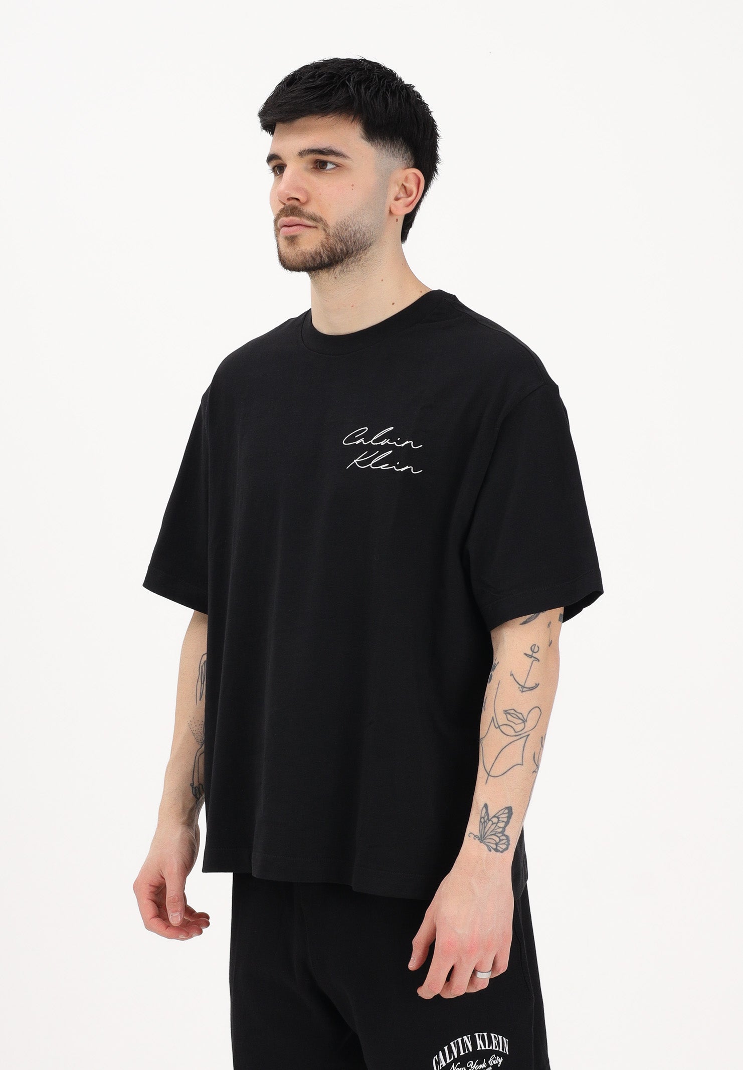 CALVIN KLEIN JEANS T-shirt a manica corta nera da uomo con logo frontale e stampa sul retro LV04RE828G UB1 CALVIN KLEIN JEANS