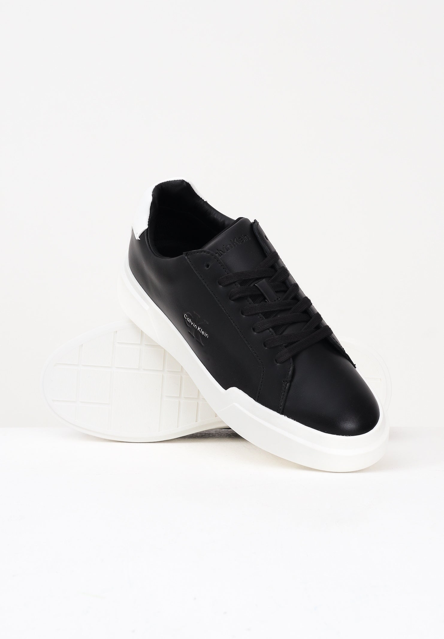 CALVIN KLEIN JEANS Sneakers nere da uomo con logo YM0YM013440GM . CALVIN KLEIN JEANS
