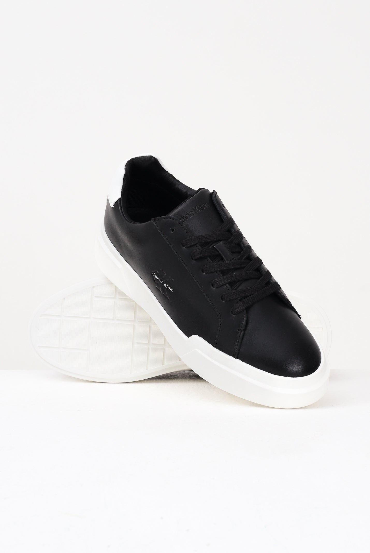CALVIN KLEIN JEANS Sneakers nere da uomo con logo YM0YM013440GM . CALVIN KLEIN JEANS