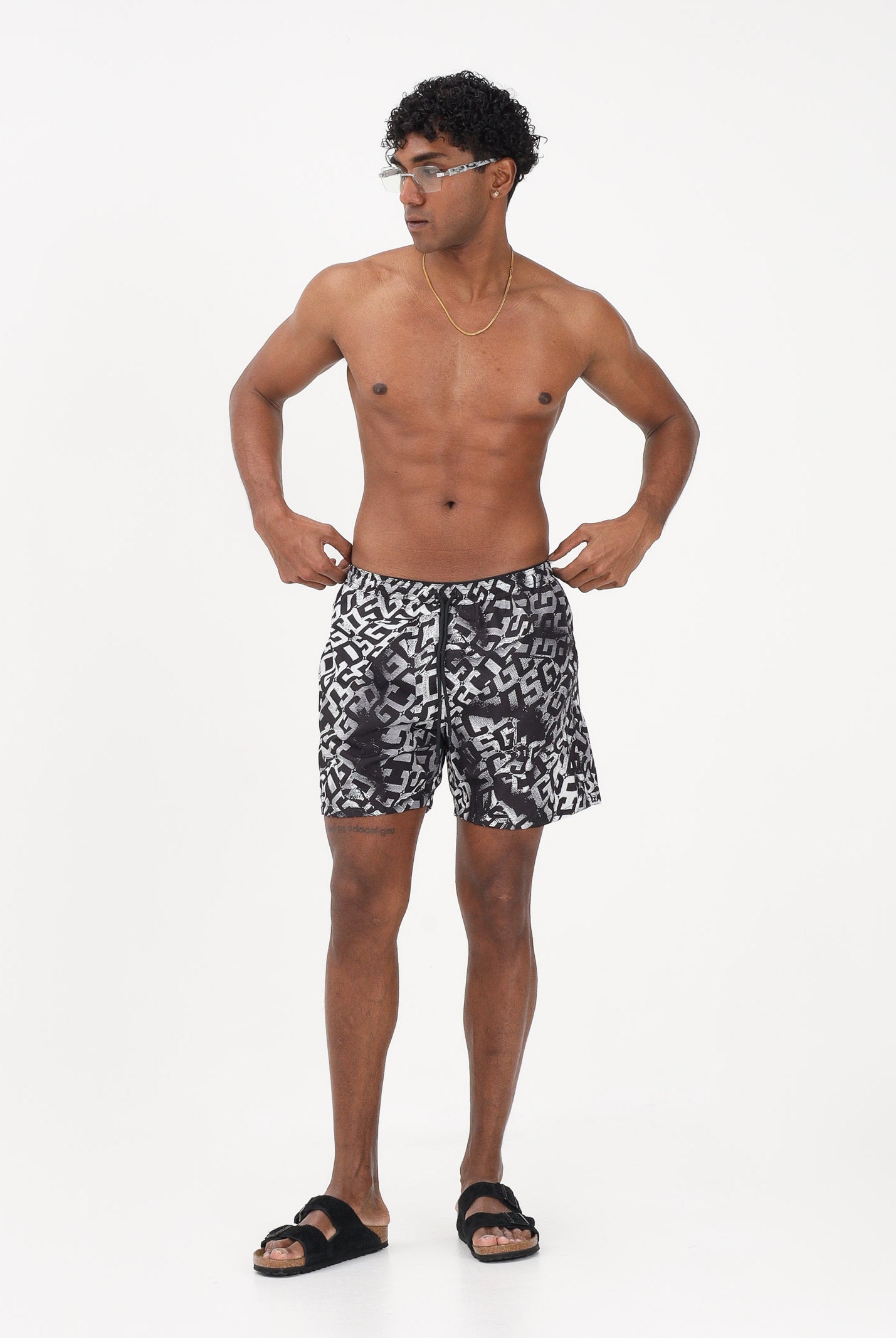 GCDS Shorts mare nero da uomo con stampa logo all-over C1MEQS250T075 999A GCDS