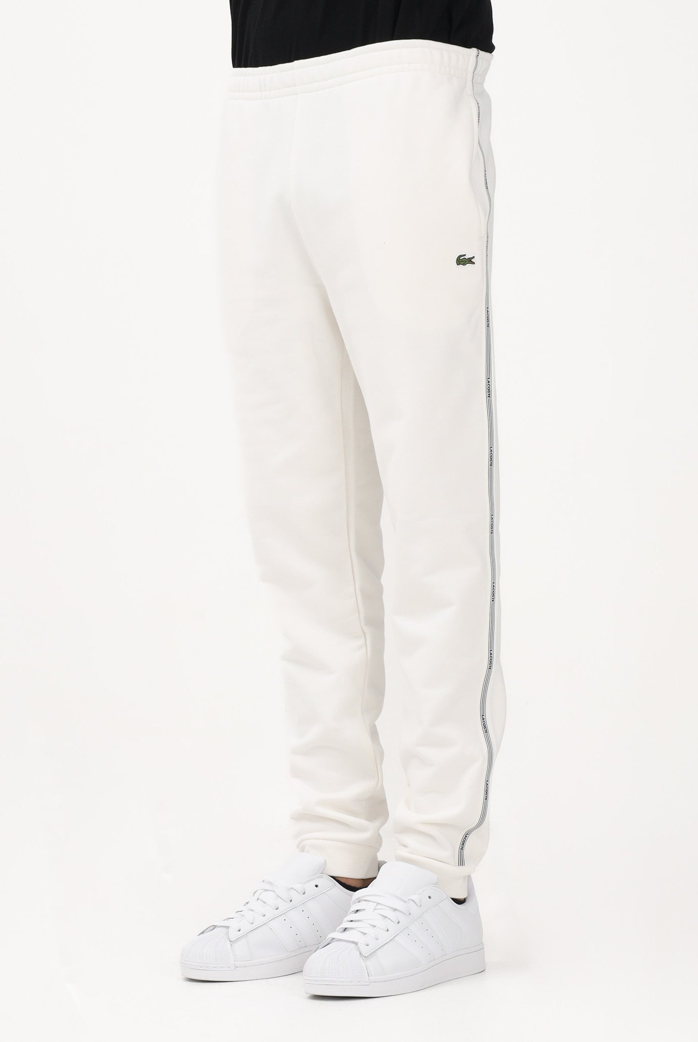 LACOSTE Pantalone sportivo bianco da uomo con rifiniture laterali logate XH0883 70V LACOSTE