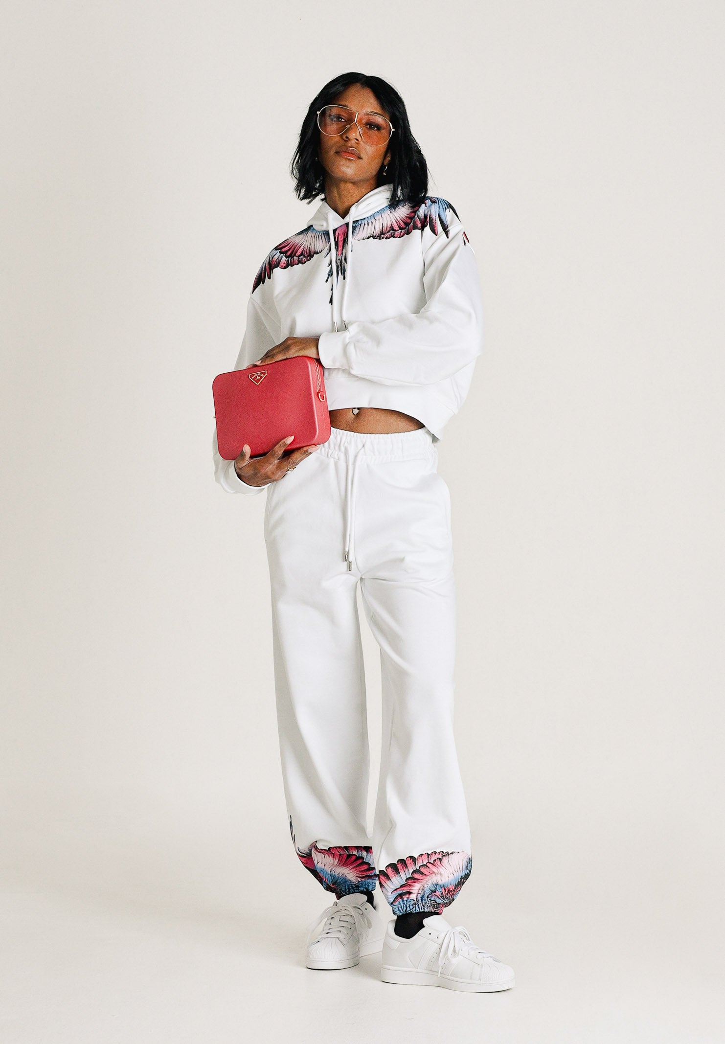 MARCELO BURLON COUNTY OF MILAN Pantalone sportivo bianco da donna con stampa sul fondo 26ECM30107 BICERO MARCELO BURLON COUNTY OF MILAN