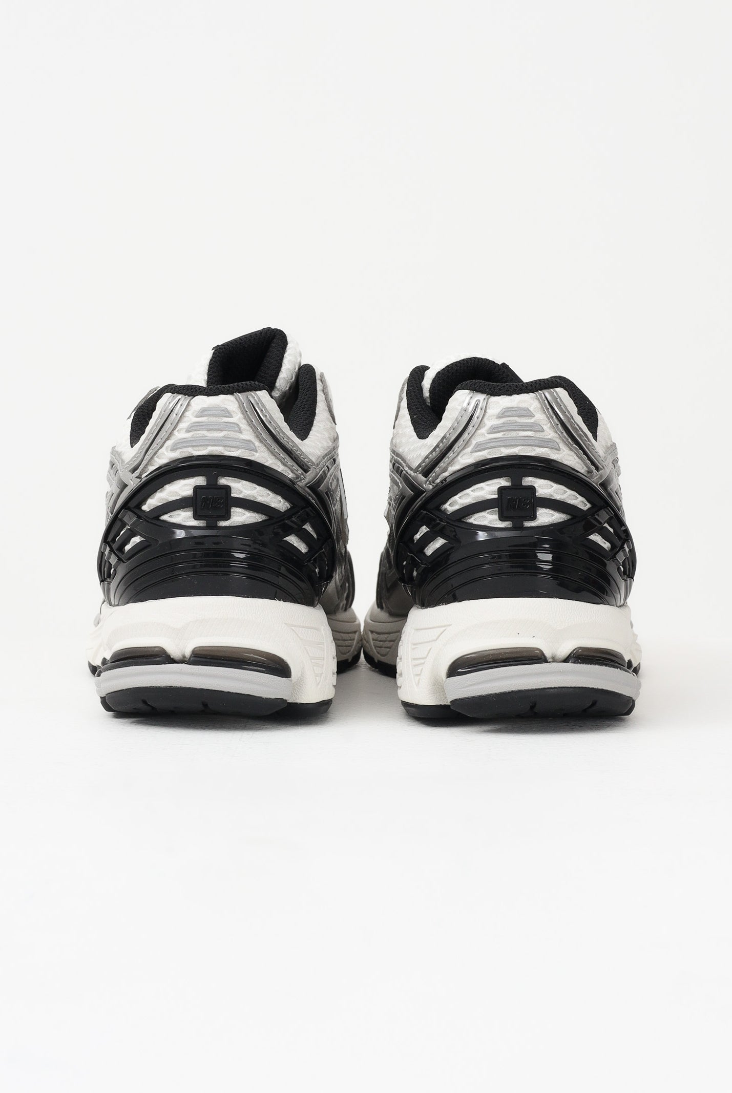 NEW BALANCE Sneakers 1906 bianche, argento e nere da uomo M1906RER . NEW BALANCE
