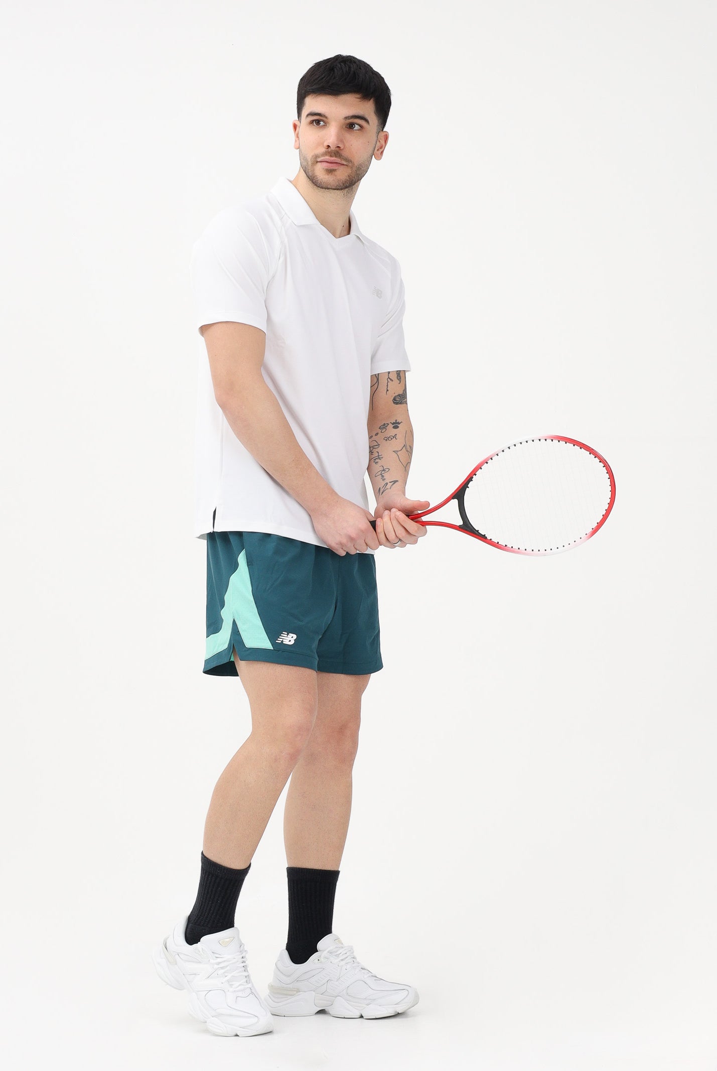 NEW BALANCE Polo a manica corta Tournament Dry bianca da uomo MT61W0HTWT . NEW BALANCE