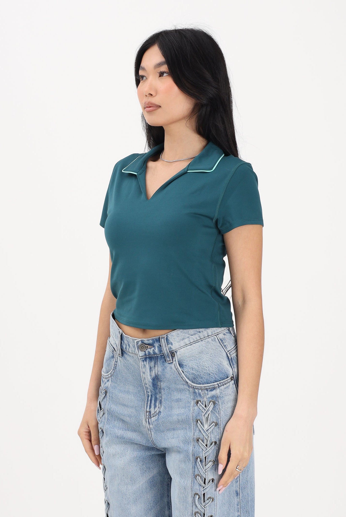 NEW BALANCE Polo a manica corta ottanio da donna WT61S8TLAAV . NEW BALANCE
