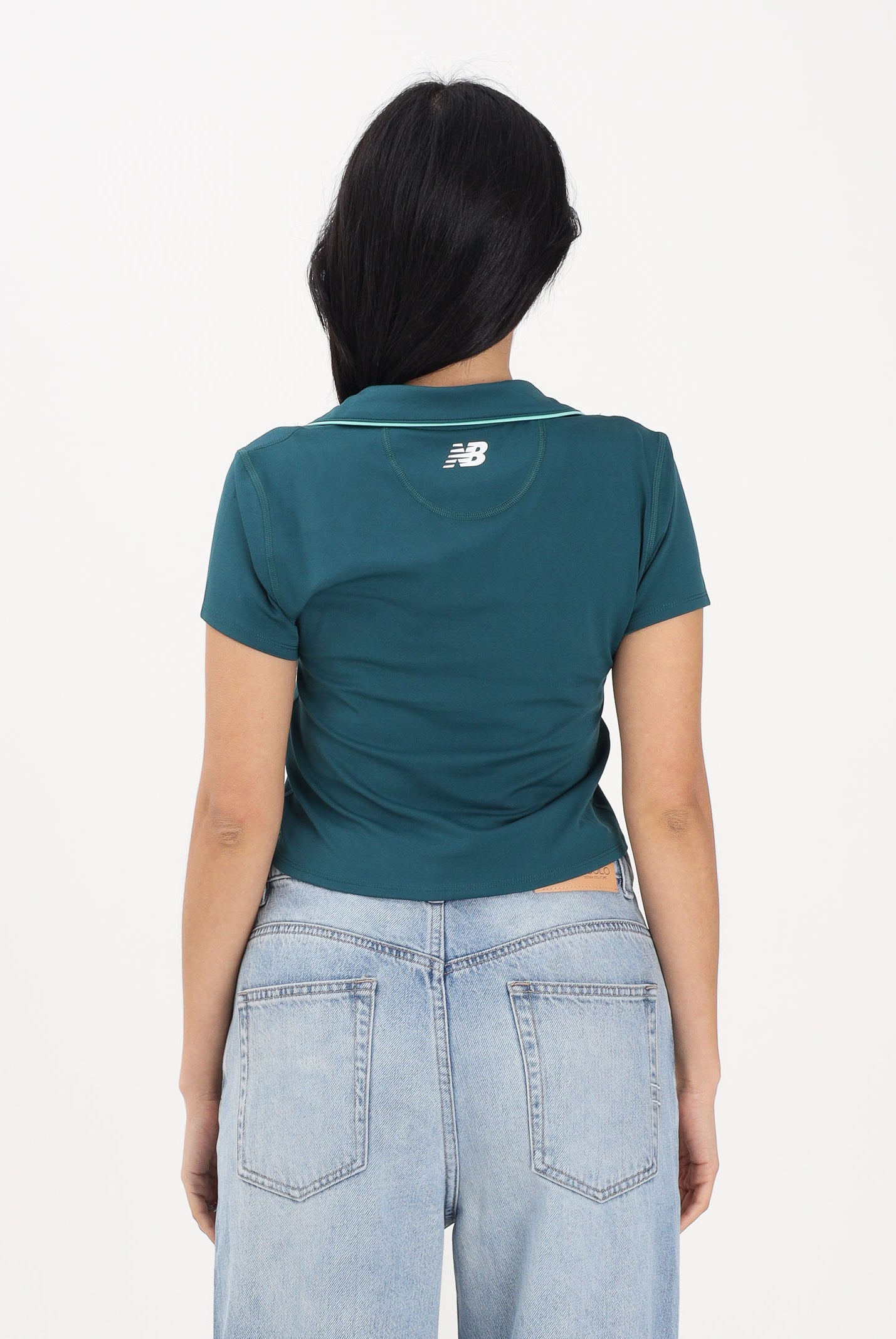 NEW BALANCE Polo a manica corta ottanio da donna WT61S8TLAAV . NEW BALANCE