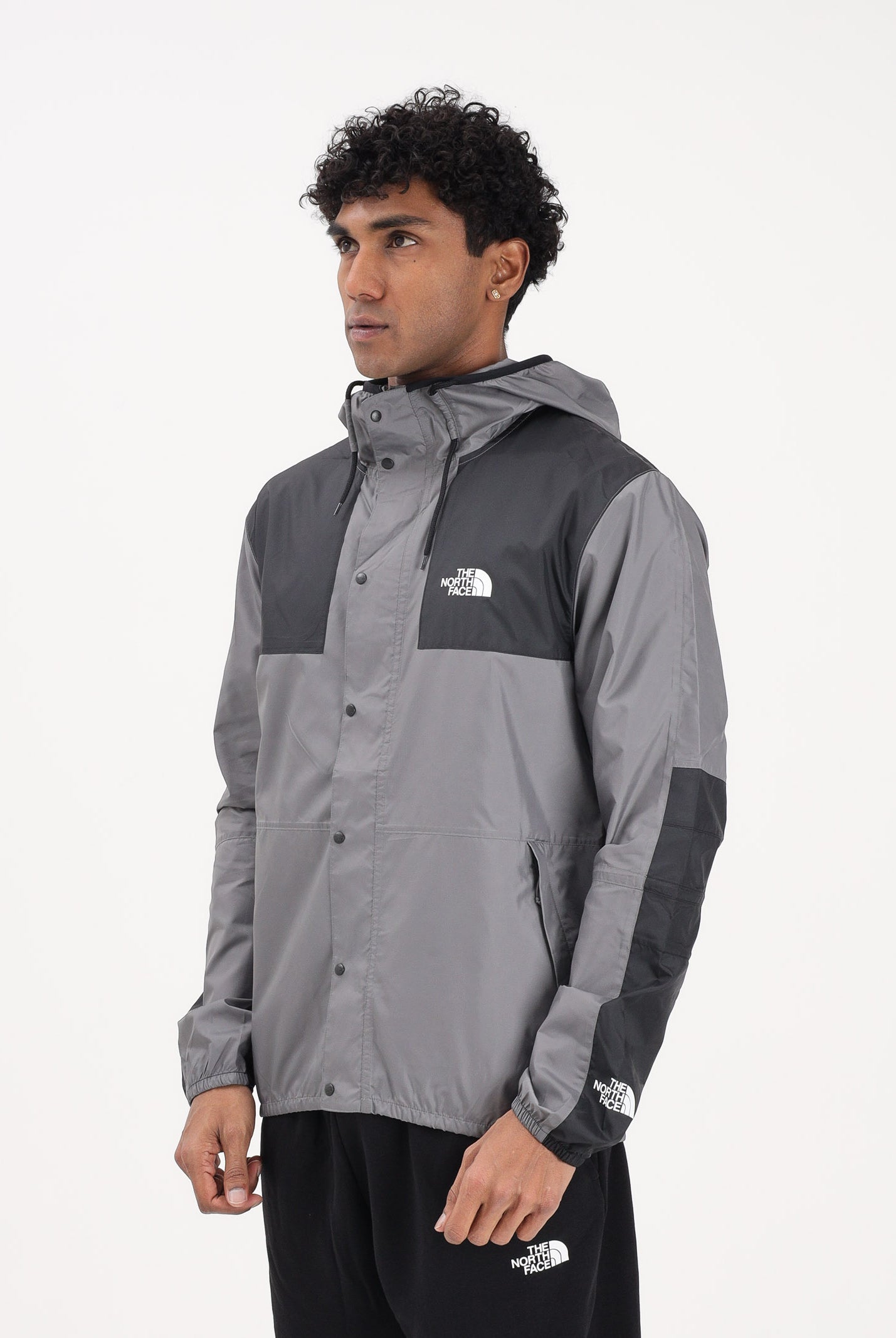 THE NORTH FACE Giacca a vento Seasonal Mountain Jacket grigia e nera da uomo NF0A5IG34GU1 . THE NORTH FACE