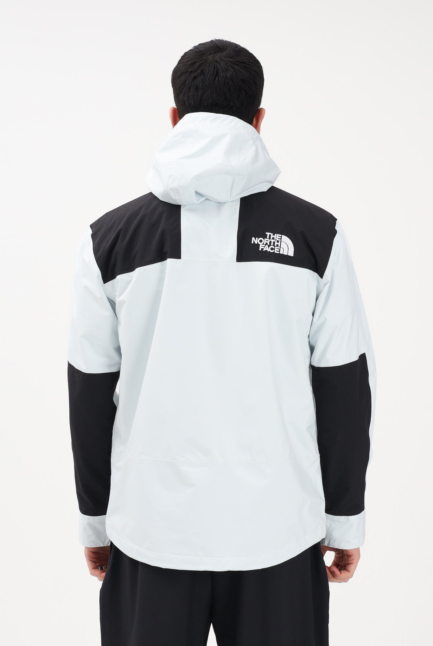 THE NORTH FACE Giacca a vento Reign On celeste e nera da uomo NF0A8B5GJL61 . THE NORTH FACE
