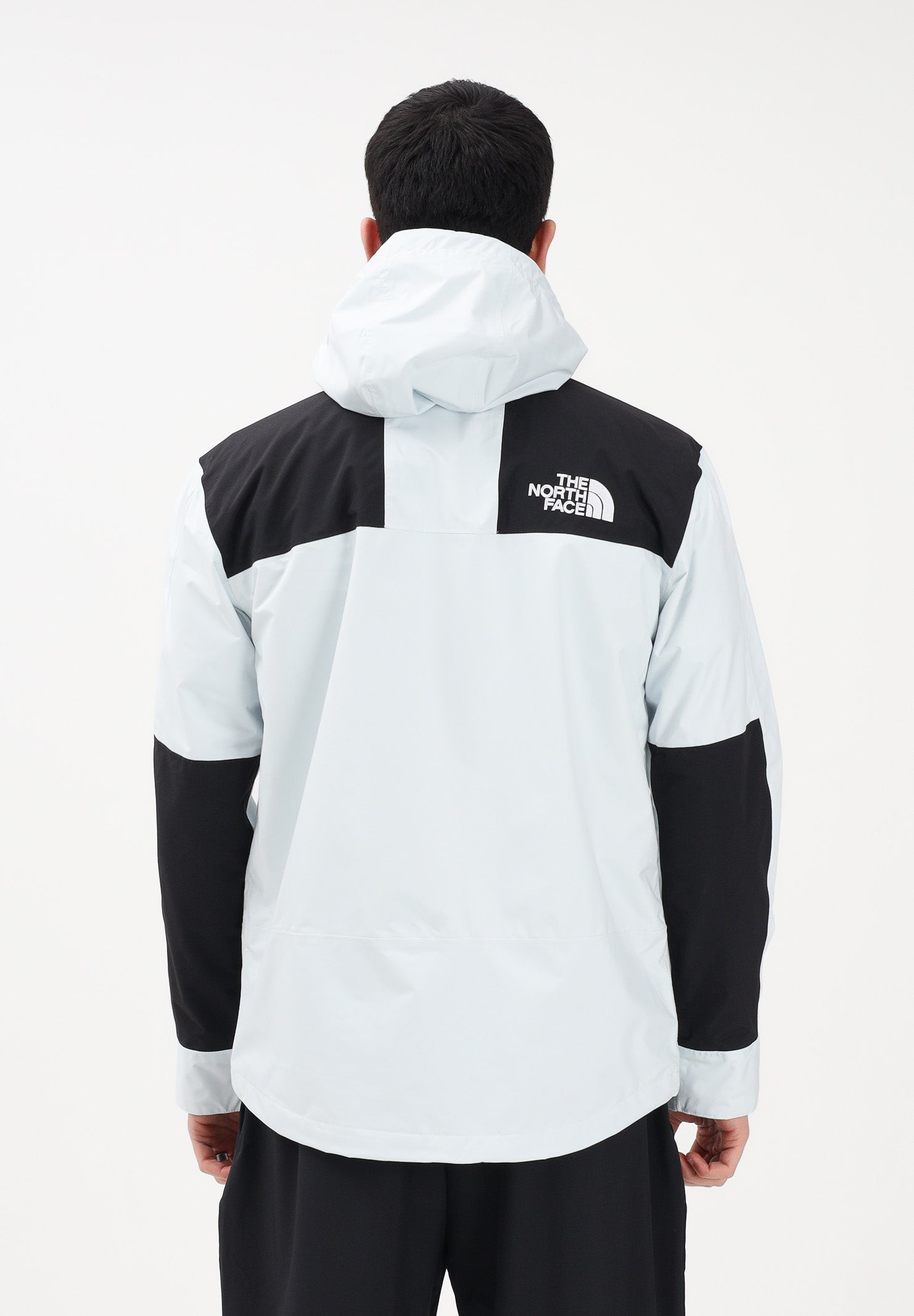 THE NORTH FACE Giacca a vento Reign On celeste e nera da uomo NF0A8B5GJL61 . THE NORTH FACE