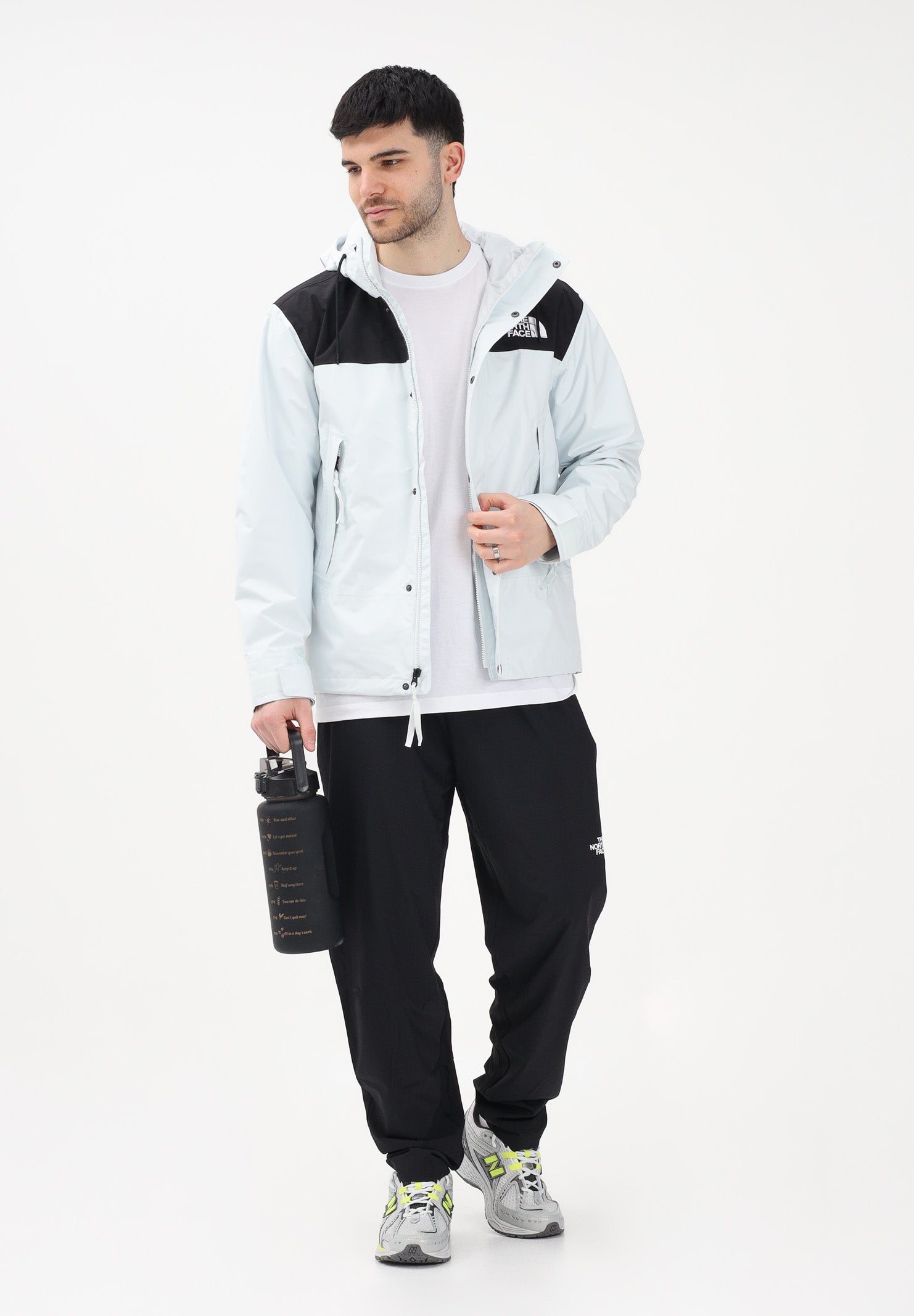 THE NORTH FACE Giacca a vento Reign On celeste e nera da uomo NF0A8B5GJL61 . THE NORTH FACE