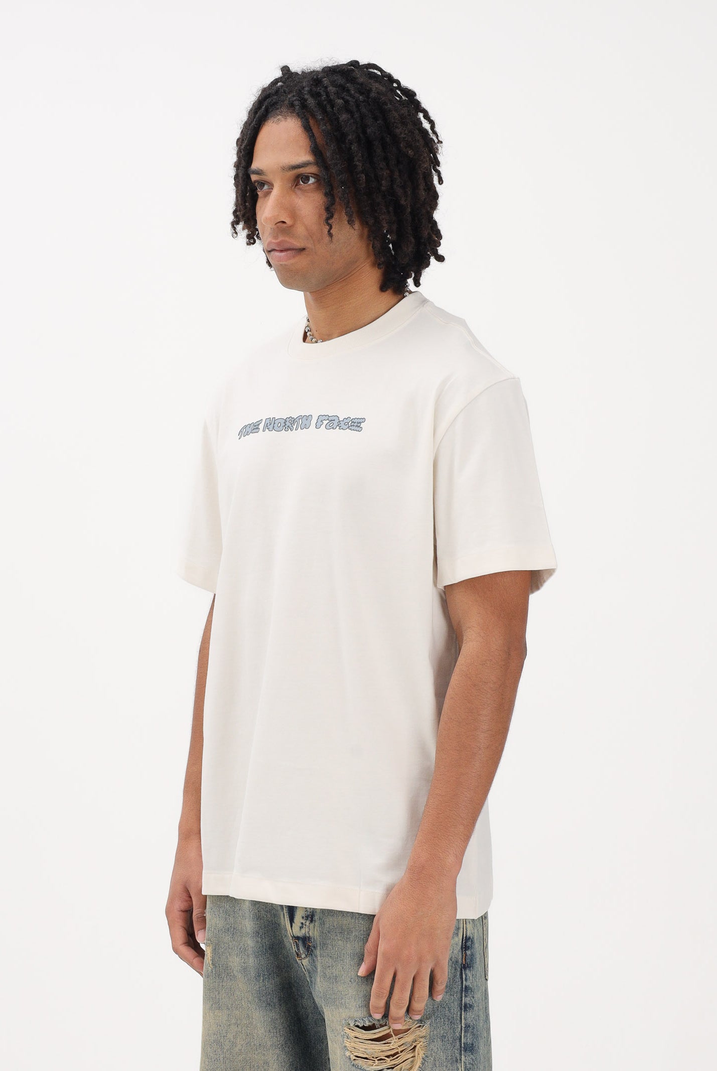 THE NORTH FACE T-shirt a manica corta Logo Twist Relaxed panna da uomo NF0A8GQVQLI1 . THE NORTH FACE
