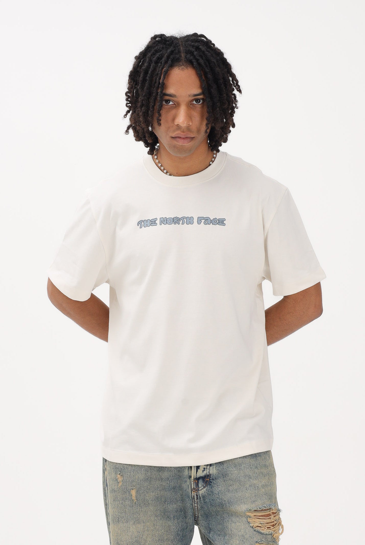 THE NORTH FACE T-shirt a manica corta Logo Twist Relaxed panna da uomo NF0A8GQVQLI1 . THE NORTH FACE