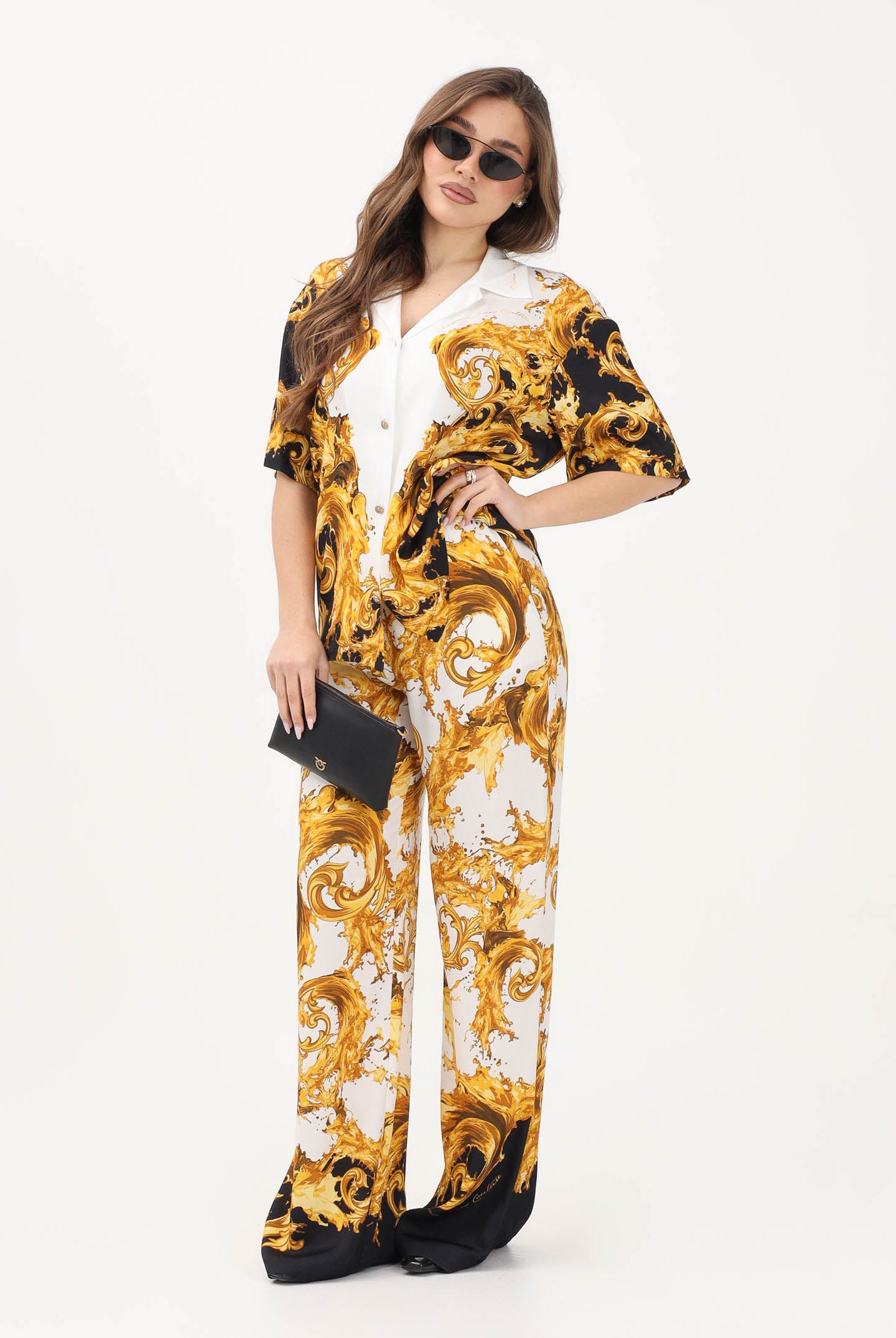 VERSACE JEANS COUTURE Pantalone bianco e nero da donna con stampa Wave Couture 80HAA1P2NS833 GL1 VERSACE JEANS COUTURE