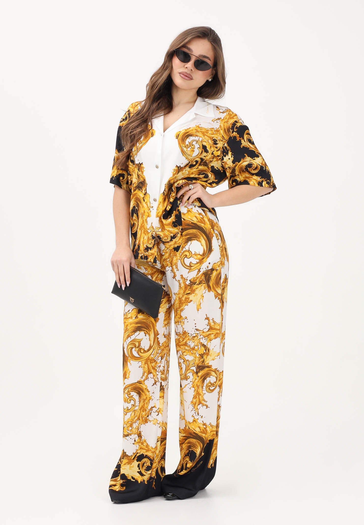 VERSACE JEANS COUTURE Pantalone bianco e nero da donna con stampa Wave Couture 80HAA1P2NS833 GL1 VERSACE JEANS COUTURE