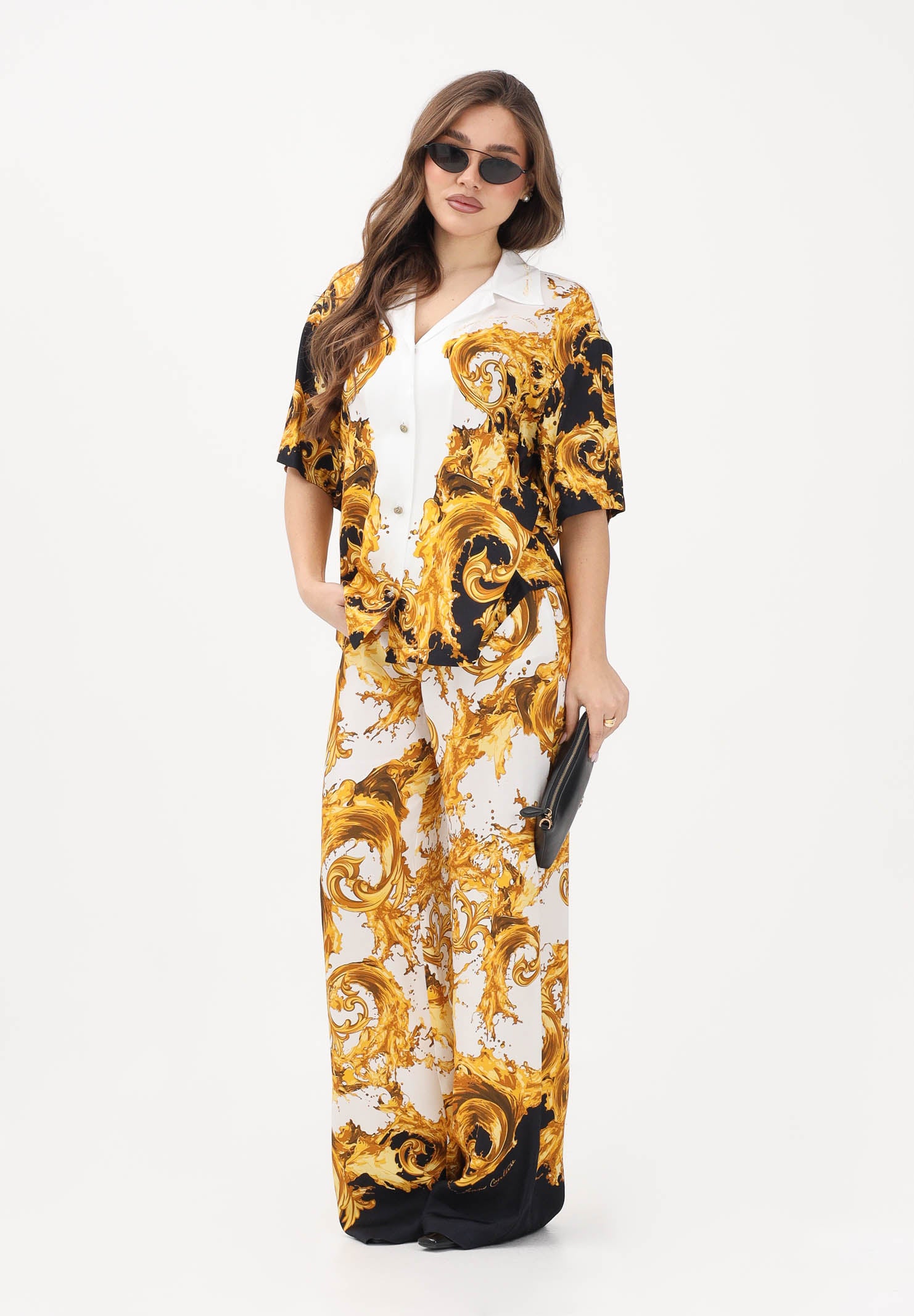 VERSACE JEANS COUTURE Pantalone bianco e nero da donna con stampa Wave Couture 80HAA1P2NS833 GL1 VERSACE JEANS COUTURE