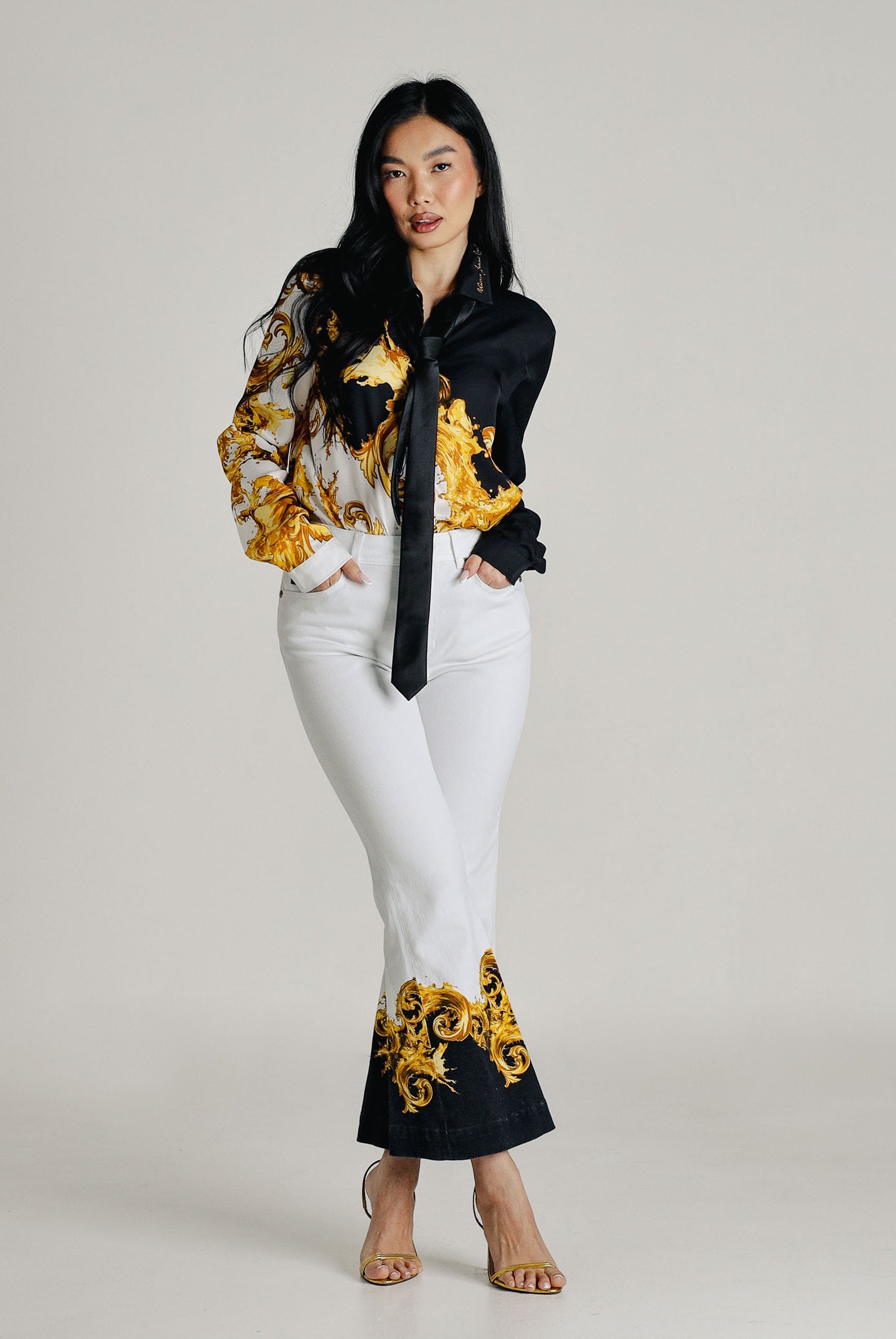 VERSACE JEANS COUTURE Jeans bianco da donna con stampa 80HAB58PES161L54 GL2 VERSACE JEANS COUTURE