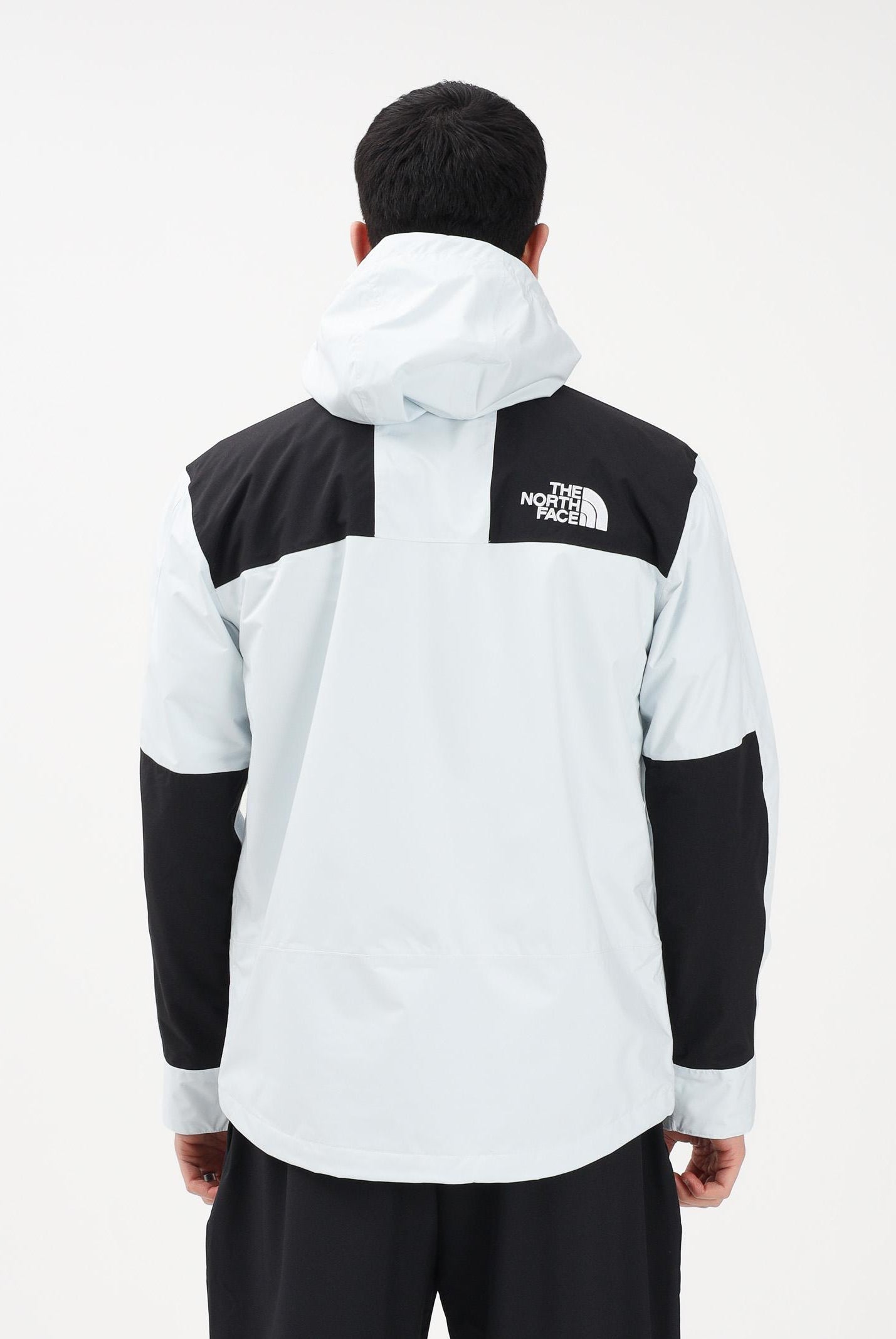 THE NORTH FACE Giacca a vento Reign On celeste e nera da uomo NF0A8B5GJL61 . THE NORTH FACE